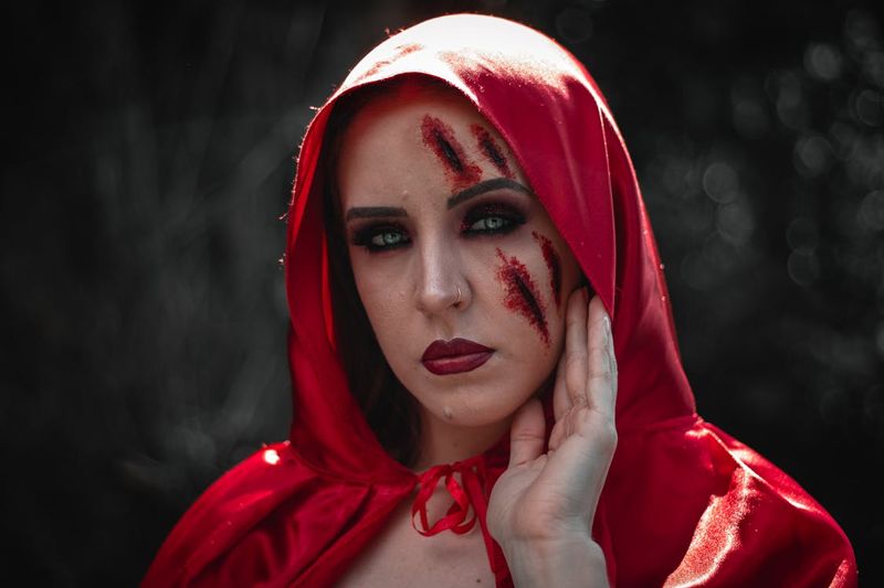 Free Woman Wearing Red Hood With Makeup  Stock Photo