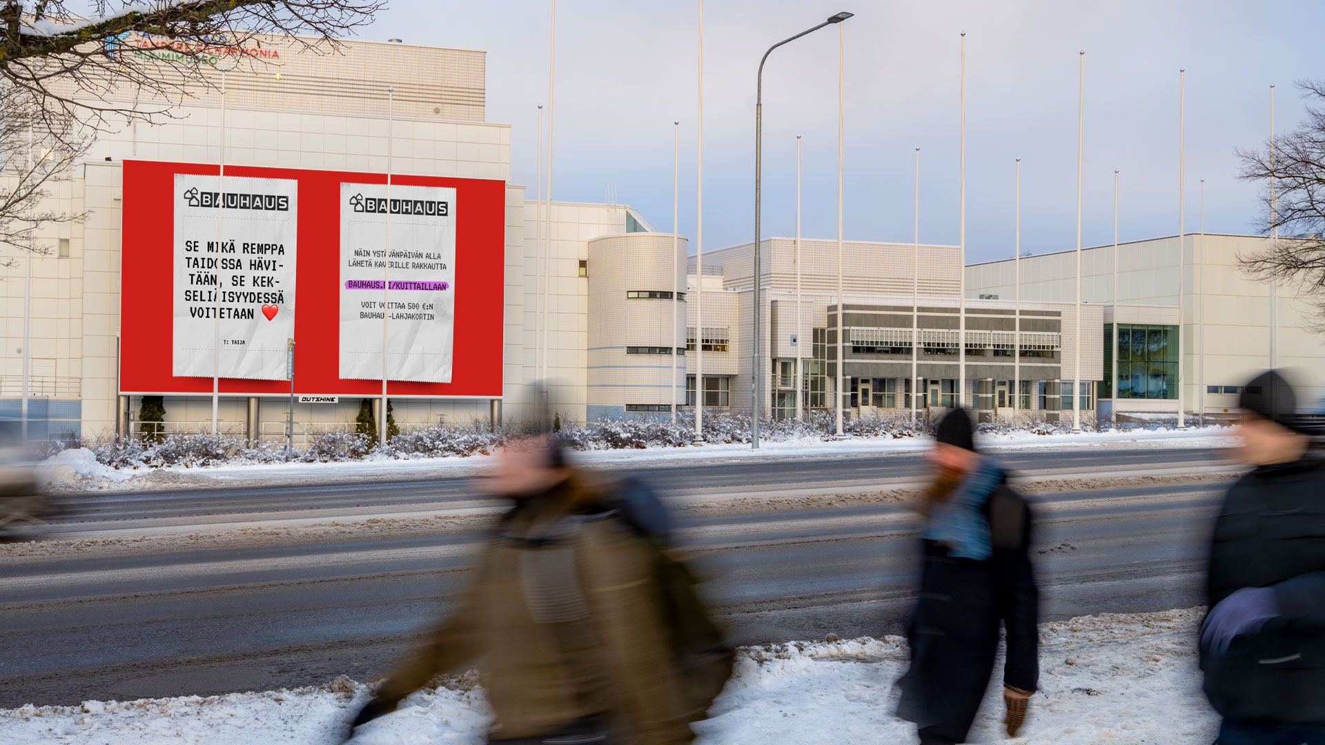 Bauhaus' Kuittaillaan campaign advertisement on Outshine's digital outdoor advertising surface on the Tampere Hall wall in a winter landscape.