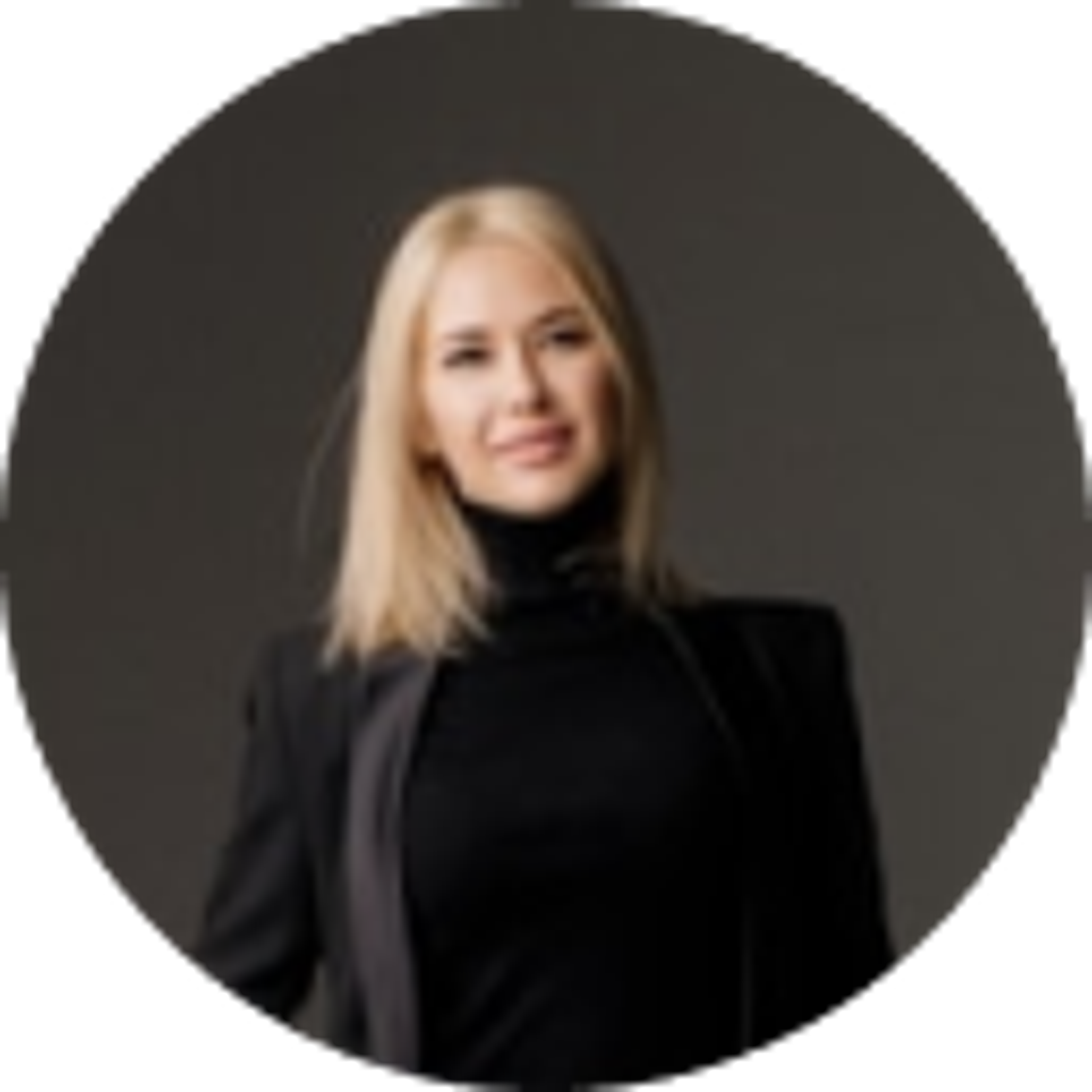 Blonde woman wearing black clothing