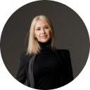 Blonde woman wearing black clothing