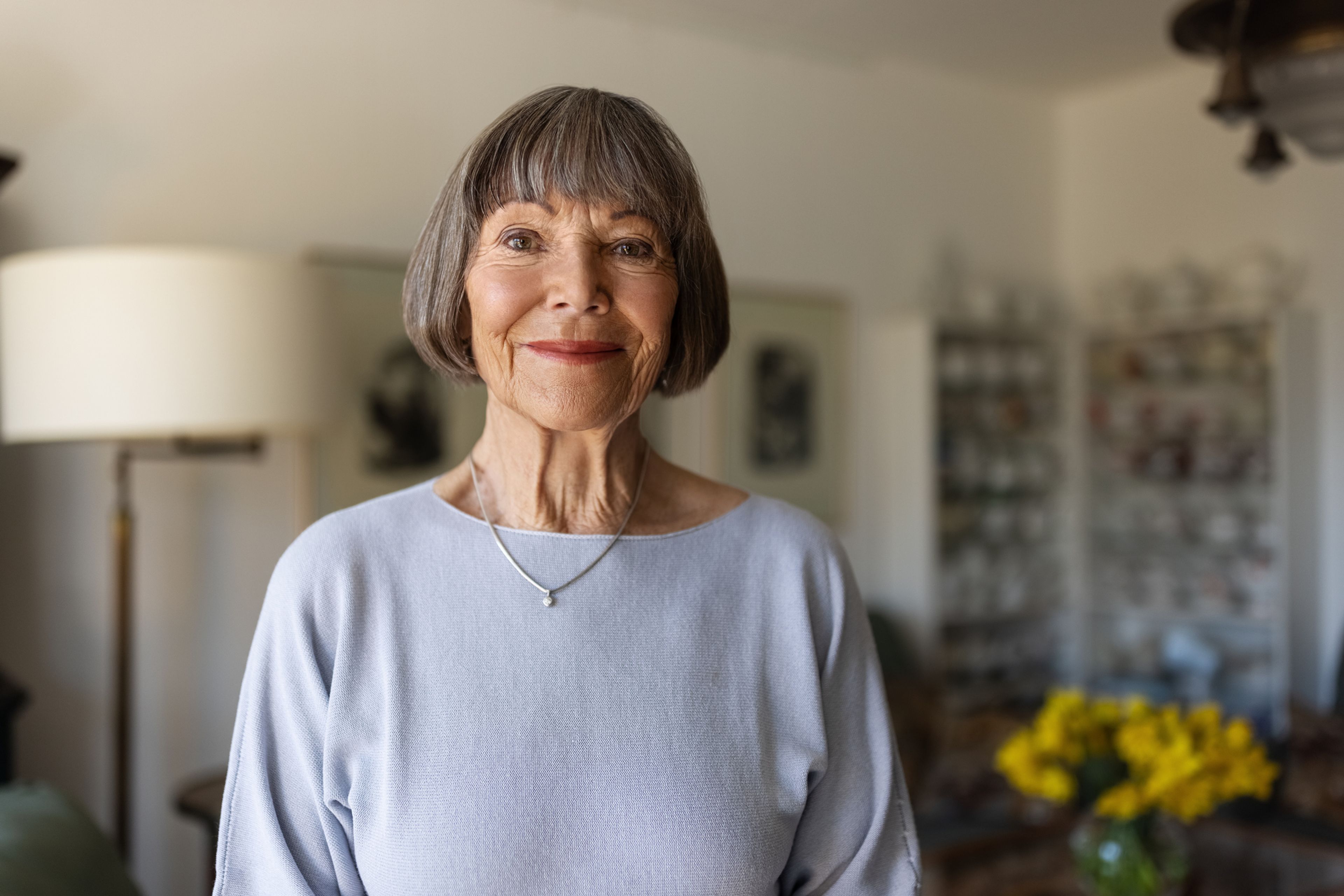 A smiling LegalRetainers customer, female, late middle aged