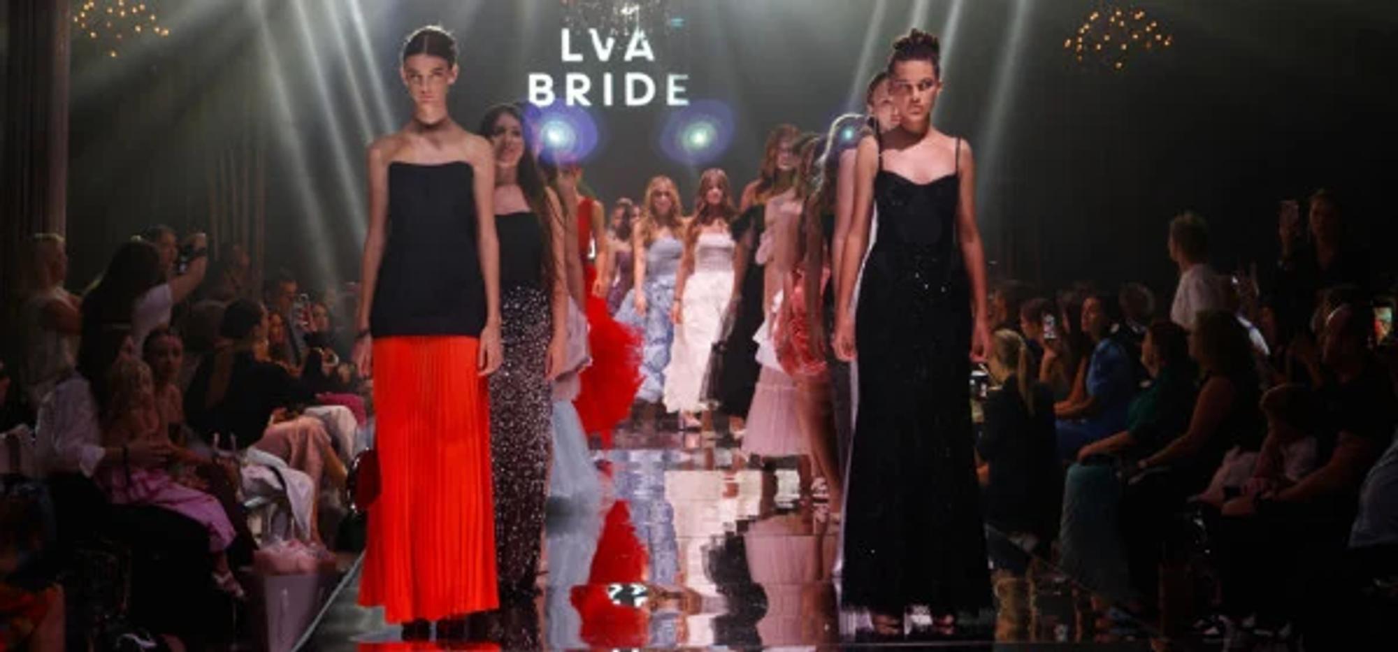 Young models in a runway group finale at a YFS show