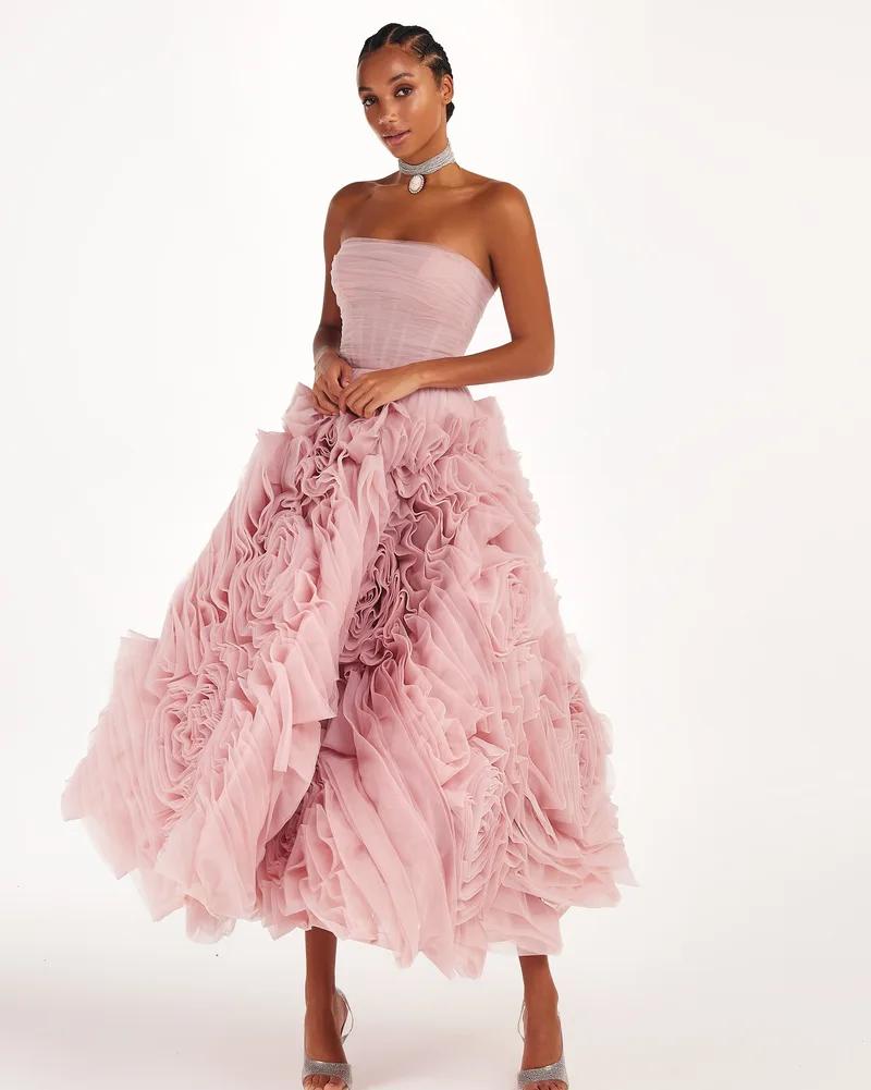 A model in a pink tiered LVA Bride gown