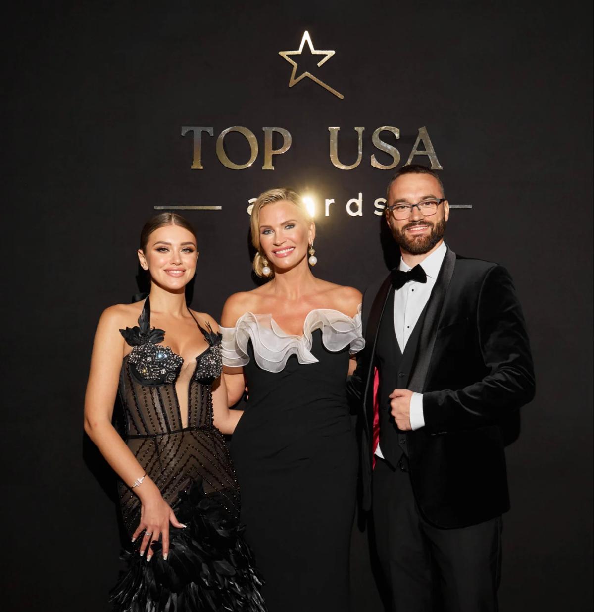 Diana Hetun and Taras Lavrovskyi with a guest at the TOP USA Awards