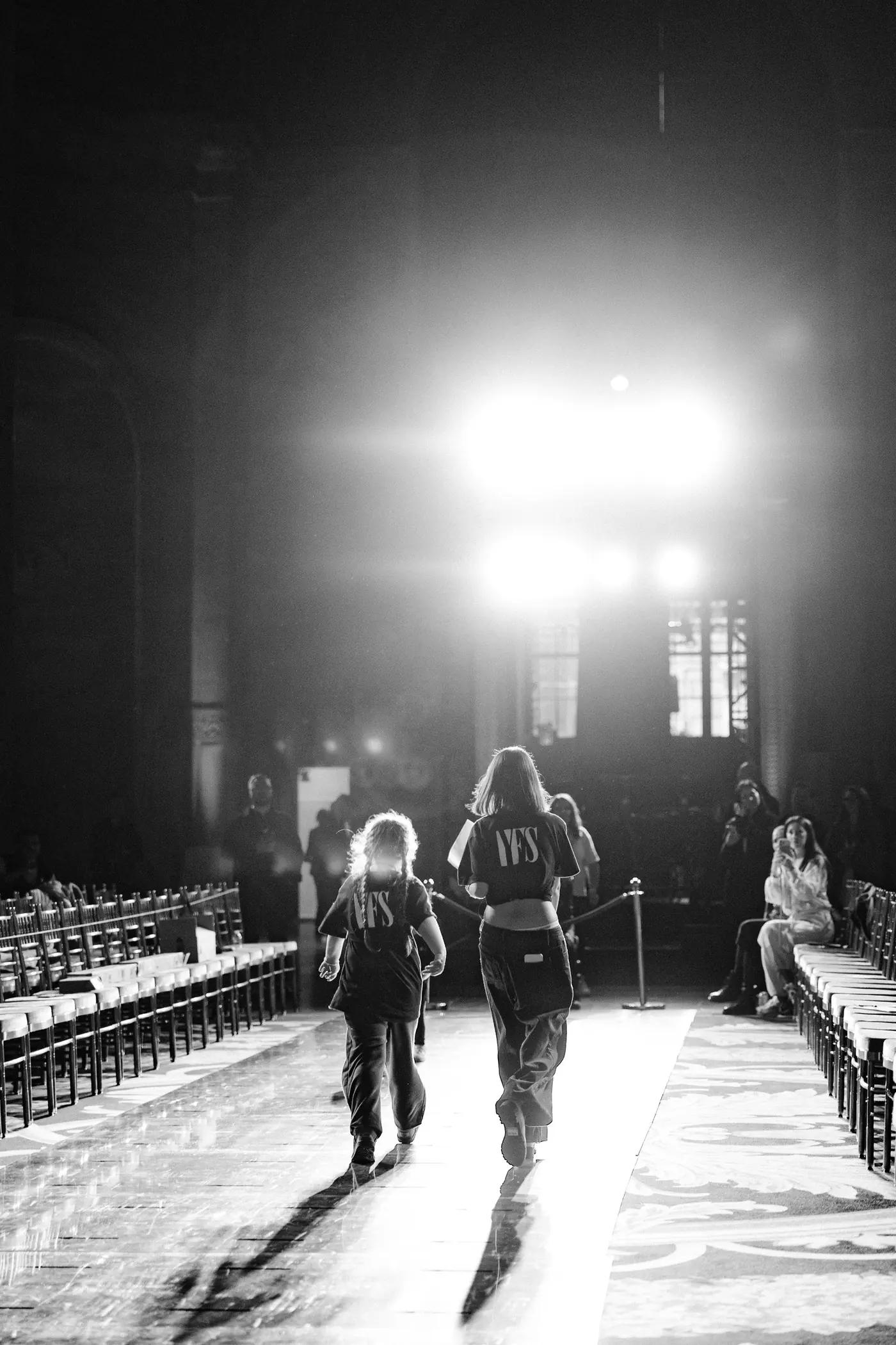 Rehearsal on the runway, photographed in black and white
