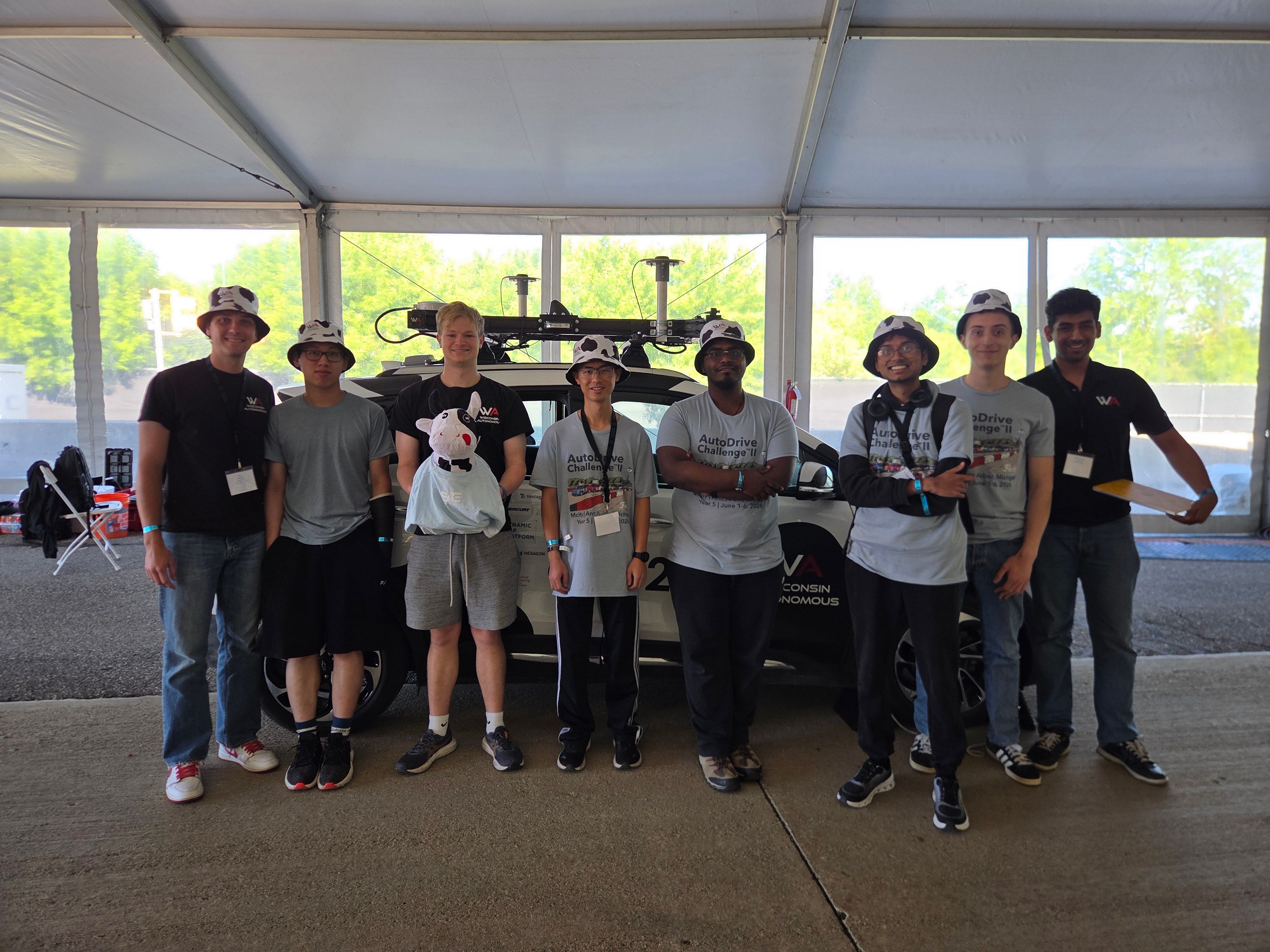 Wisconsin Autonomous team engineering bay and autonomous vehicle
