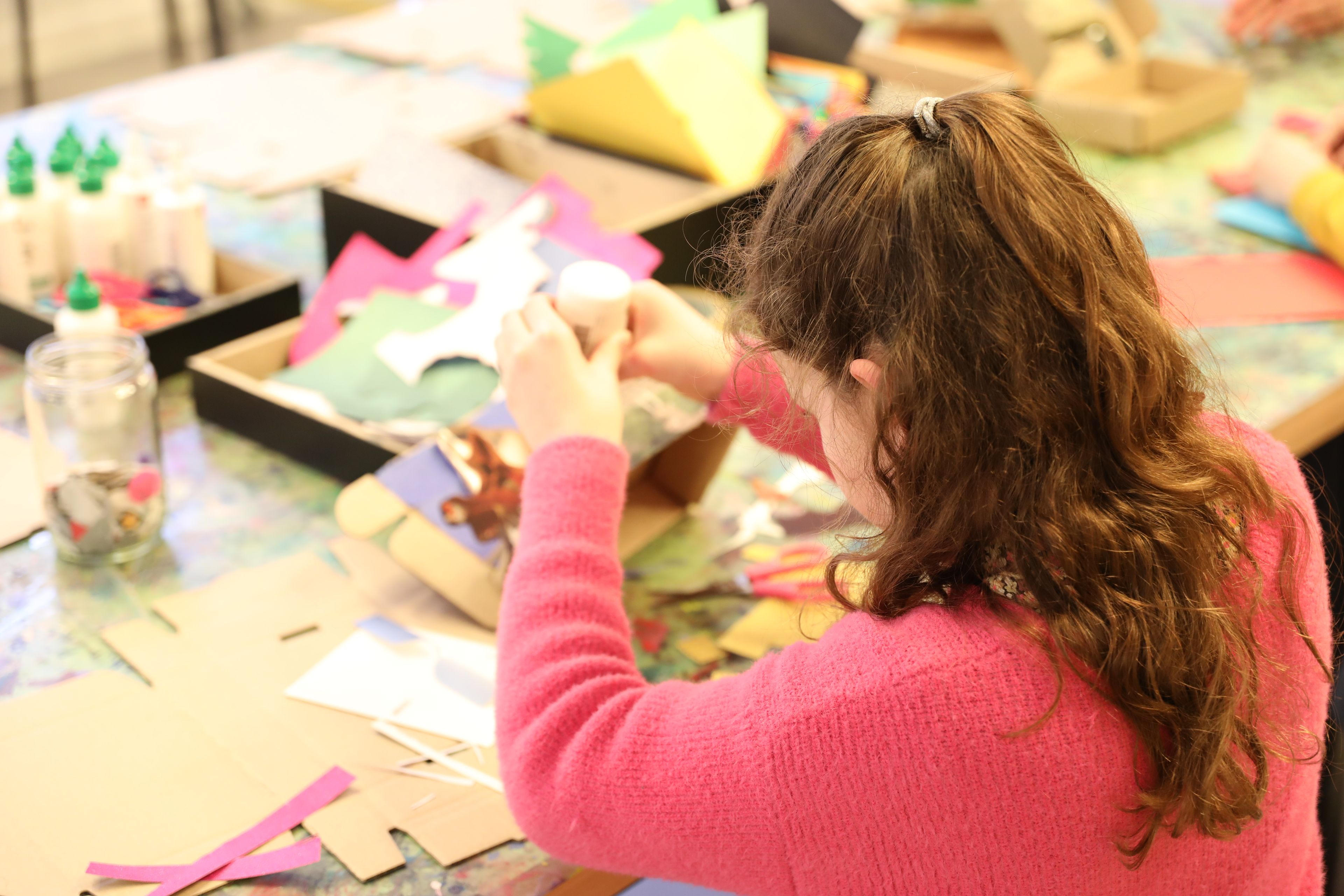 A girl taking part in the fun arts and crafts workshop at the Frans Hals Museum during school holidays 