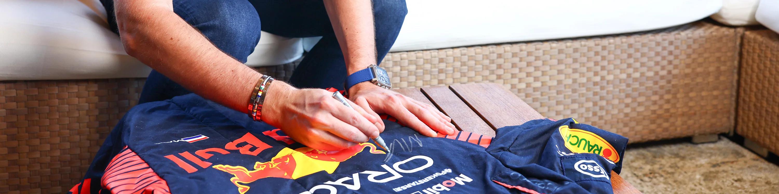 F1 Authentics Max Verstappen Canada Race Suit Plus Meet & Greet Auction Raises £108,497 For Wings For Life