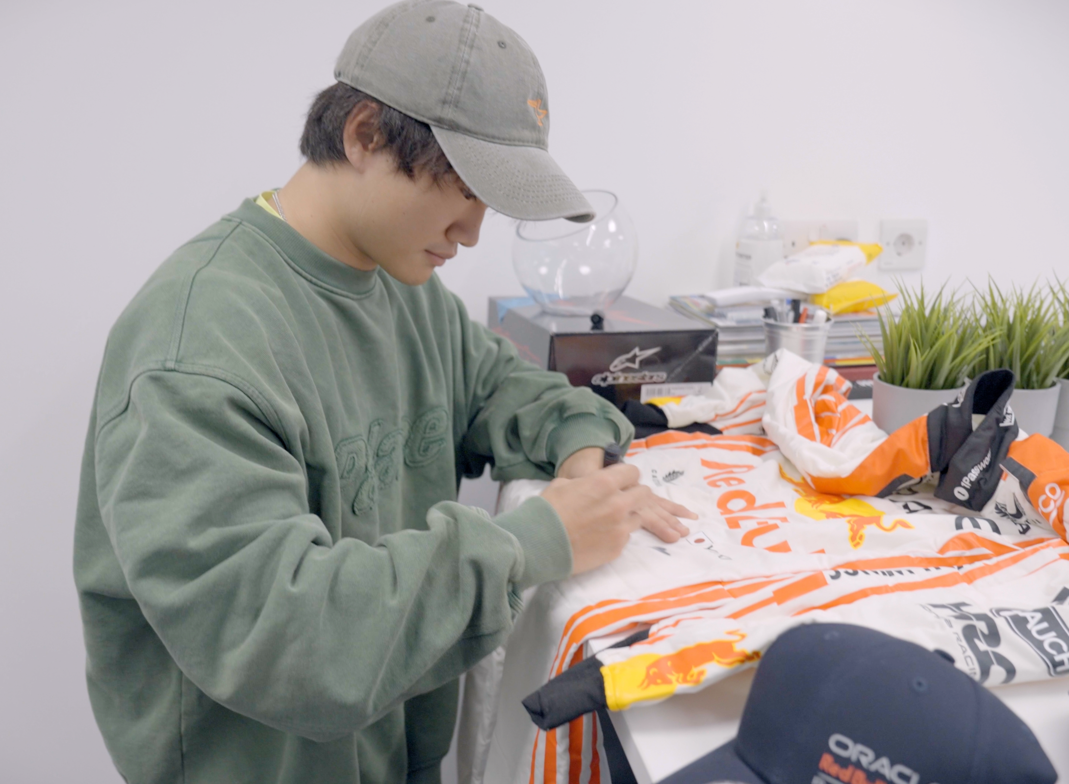 Max Verstappen & Yuki Tsunoda Japanese GP Race Suits Raise £83,500 for Wings for Life’s Spinal Research