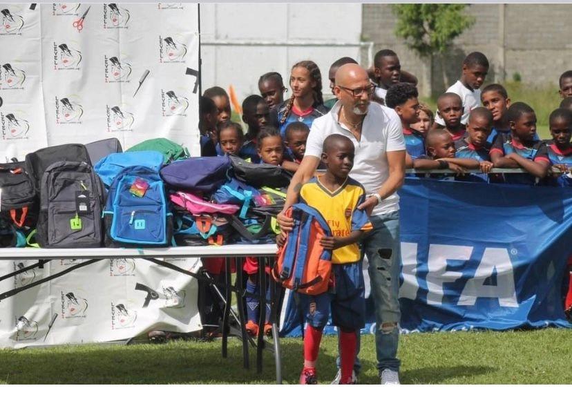 Terrence Dowden of Level 1 Beauty Lounge at the Grenada backpack giveaway