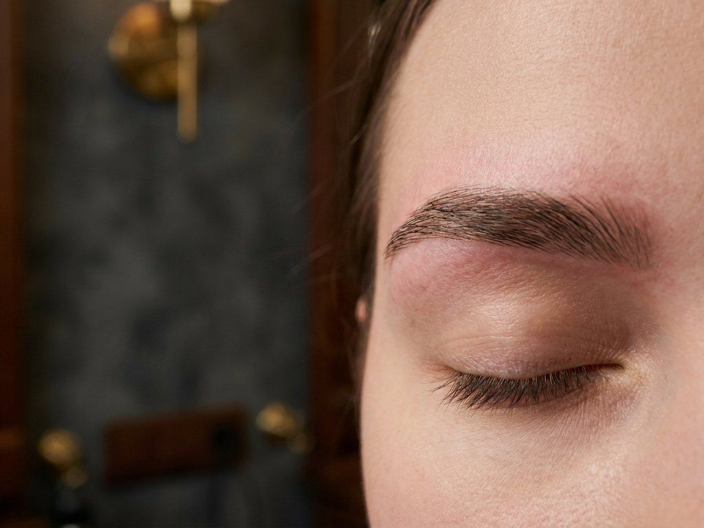 Freshly waxed and shaped natural eyebrow, close-up