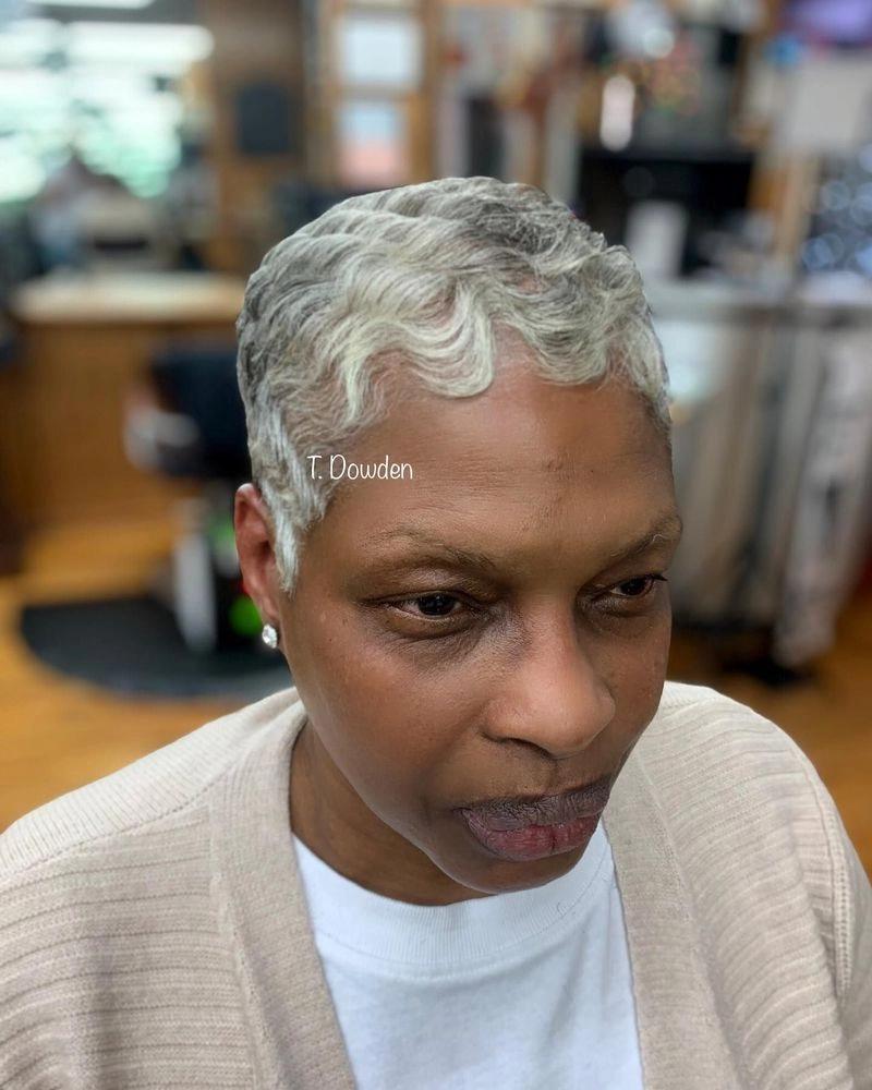 Short silver-gray natural hair cut on a woman