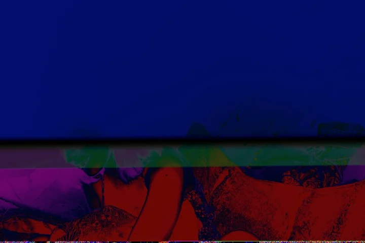 Deep blue upper field above solarized red and purple figures crossed by distortion bands.