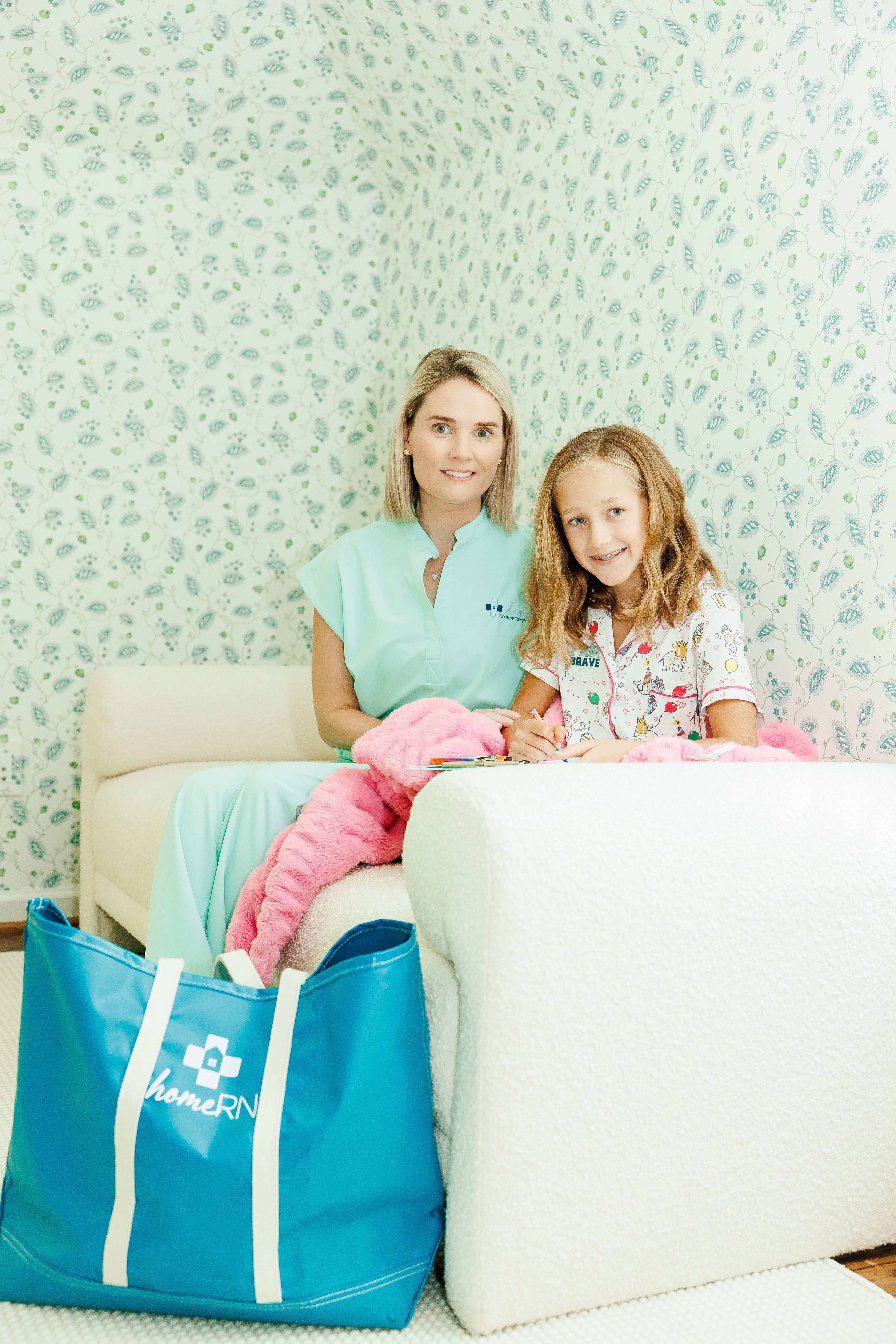 Nurse with little girl patient
