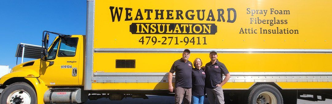 The Woods family outside a WeatherGuard Insulation truck in Bentonville, Arkansas