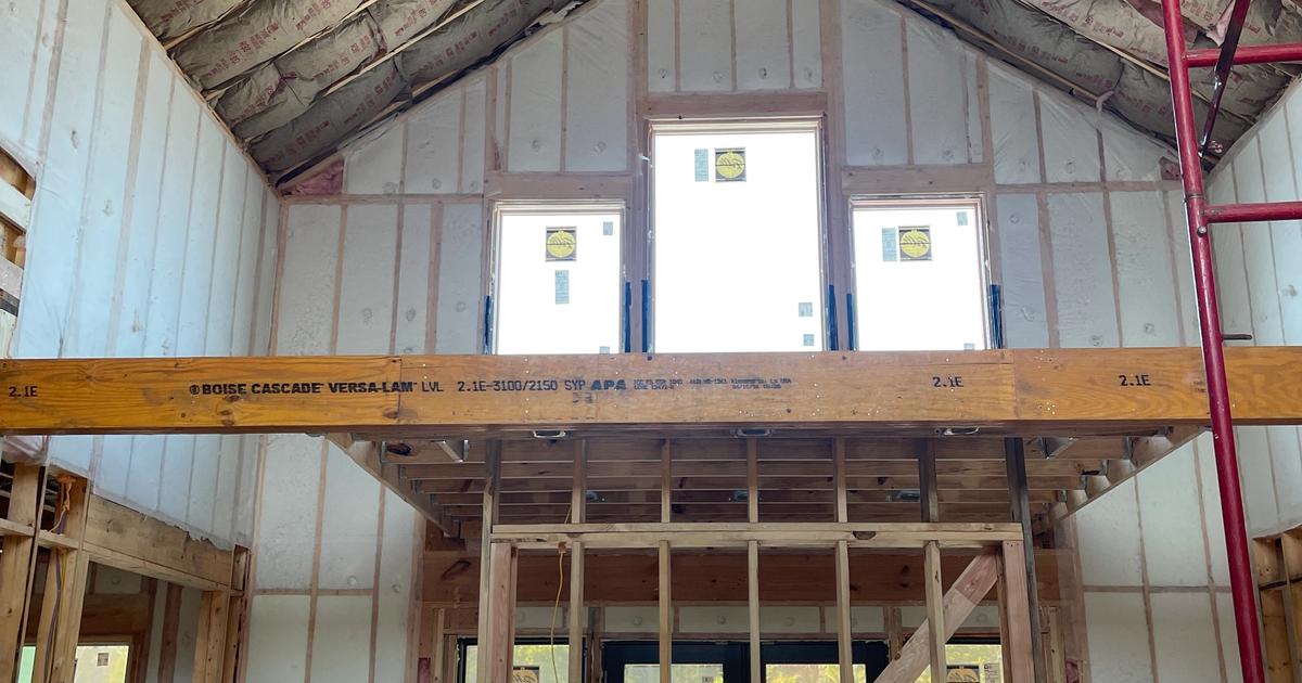 A vaulted great room where BIBS walls and ceiling batts were the right system instead of foam everywhere