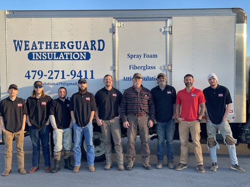 The WeatherGuard Insulation crew outside the company truck in Bentonville, Arkansas
