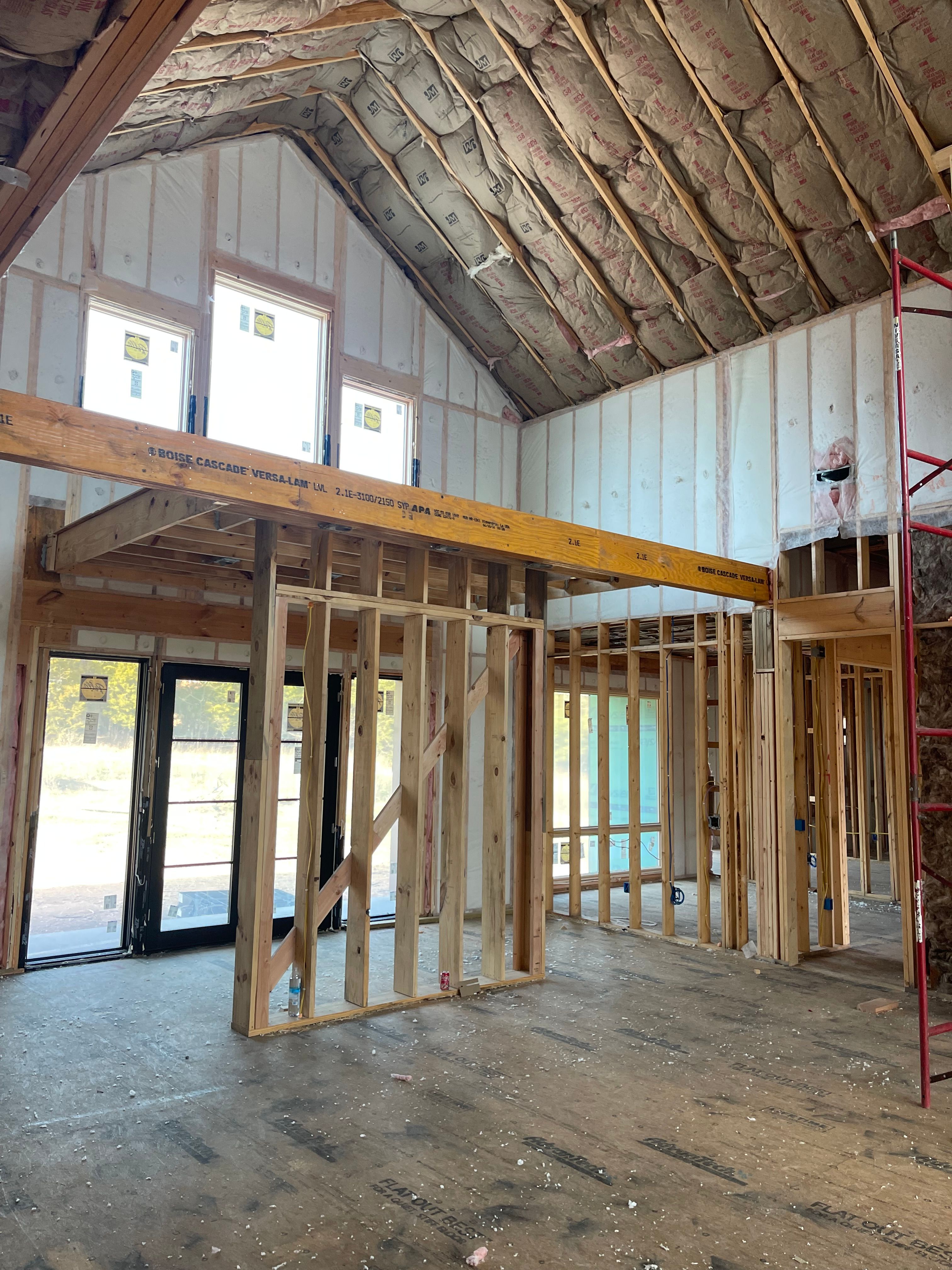 Whole-home wall and roofline insulation in progress in Bella Vista, AR
