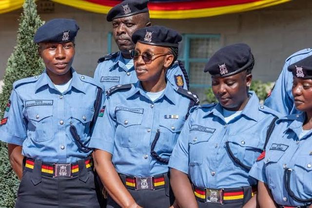 Police officers don new uniforms unveiled immediately after they graduated from Kiganjo Police Training College