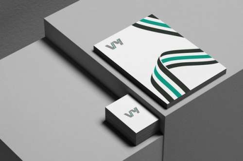 Visittkort og forside med Vy logo og grafisk element
