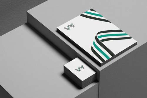 Visittkort og forside med Vy logo og grafisk element