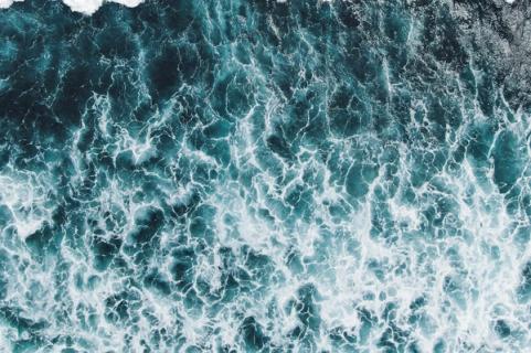 Waves breaking on open water
