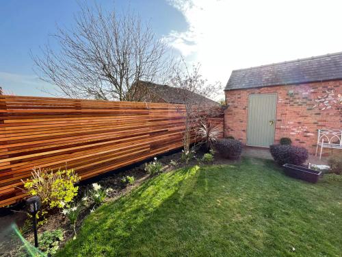 Slatted Fence Installation — cover photo