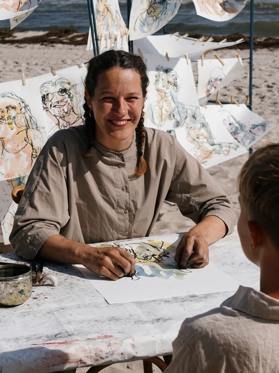 Iris drawing guests at an event