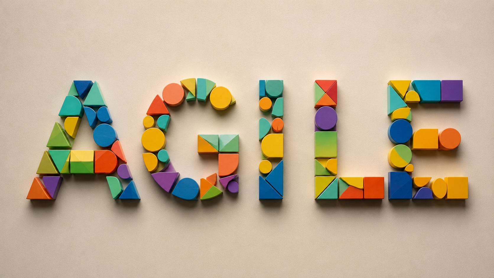 Bunte Bausteine, die das Wort AGILE formen – Sinnbild für agile Arbeit, bei der aus vielen Teilen etwas Tragfähiges entsteht.