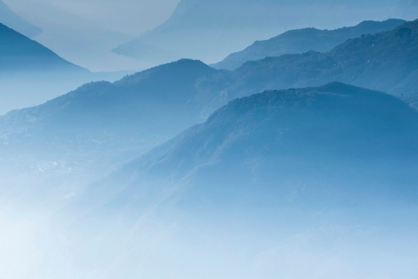 Soft fog over layered hills