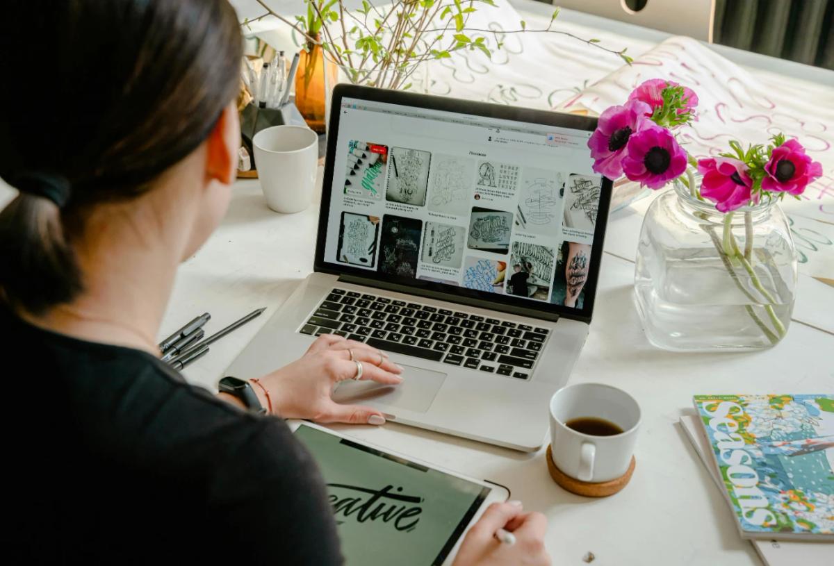 Woman using a small business website on a laptop