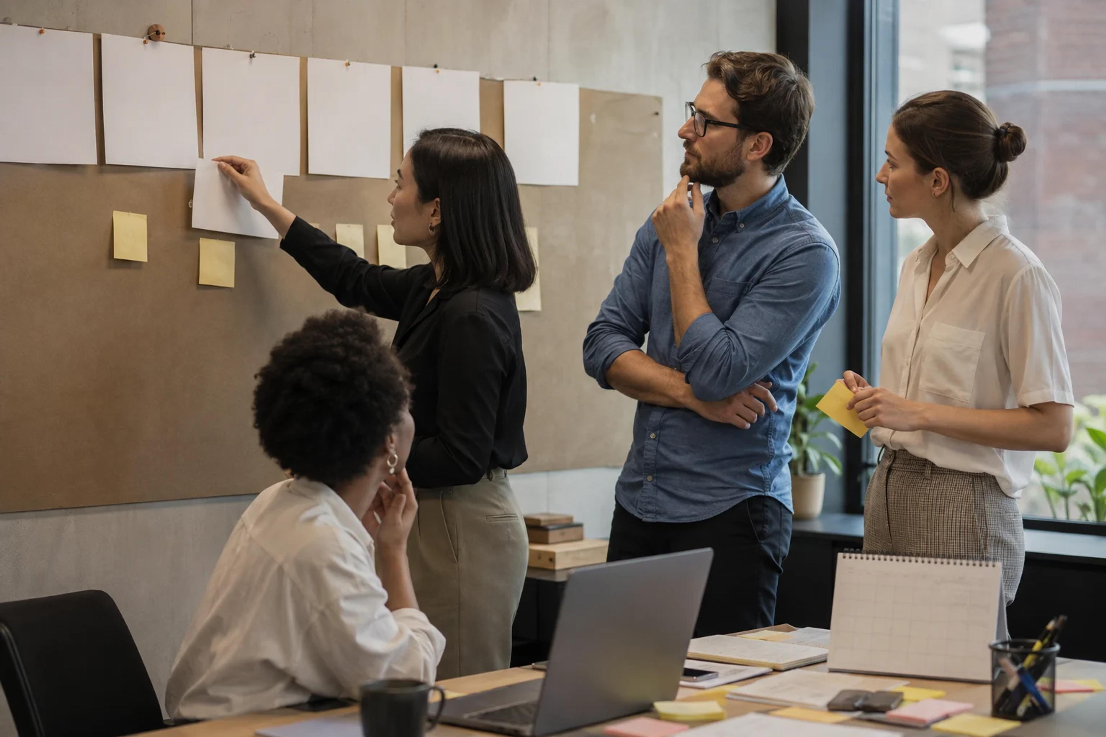 Corporate event planners review a concise team-building brief and vendor shortlist