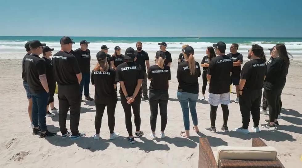 Colleagues take part in a facilitated Experience Camp Pendleton programme on Del Mar Beach