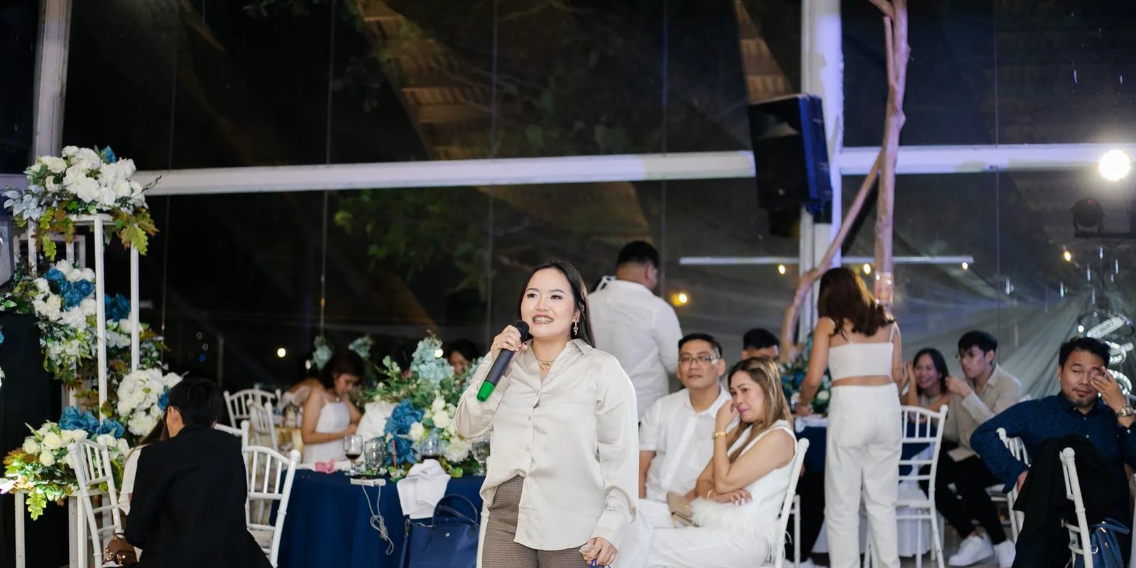 Event host managing a celebration program at a Philippine venue