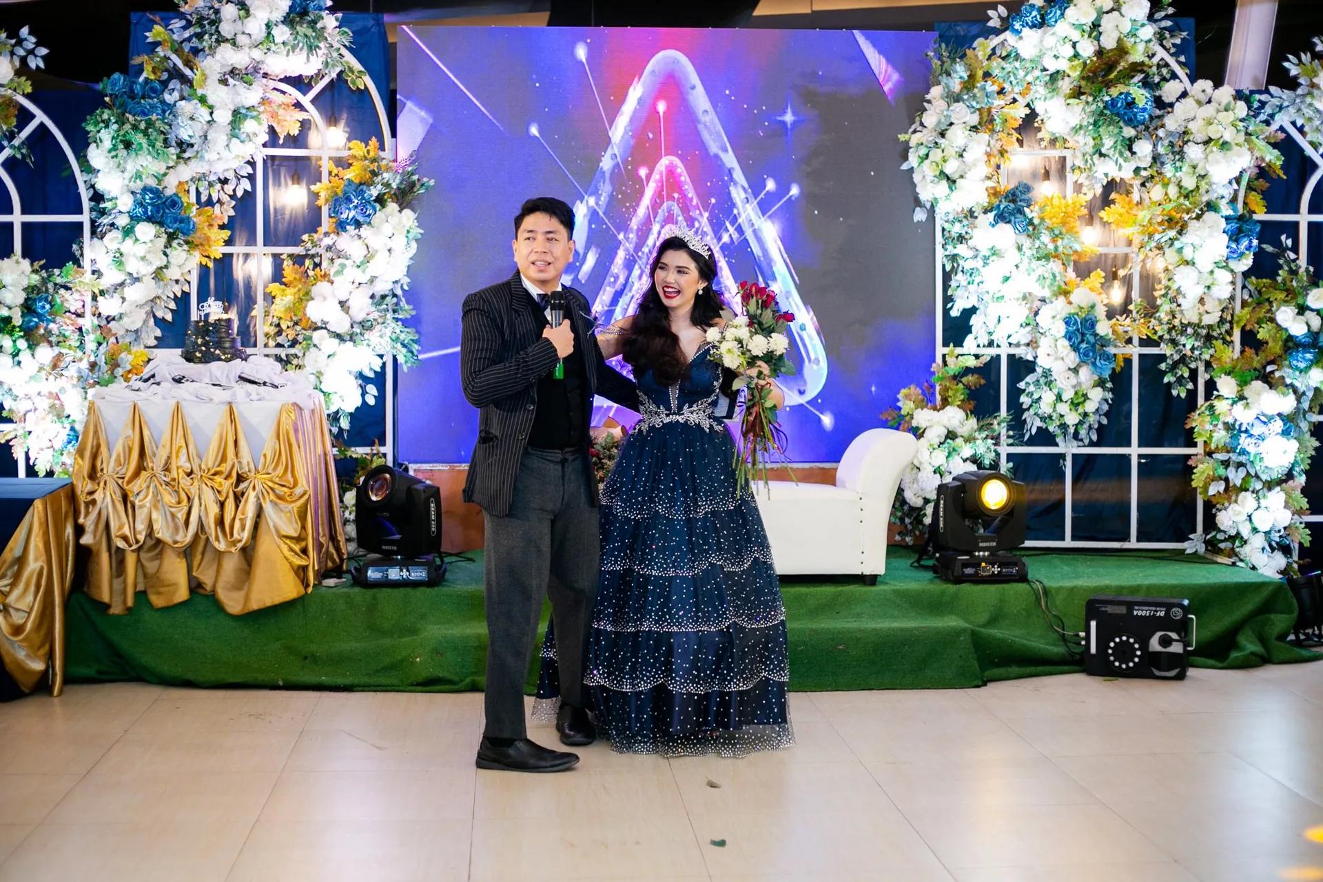 Debutante celebrating on stage at her 18th birthday in the Philippines