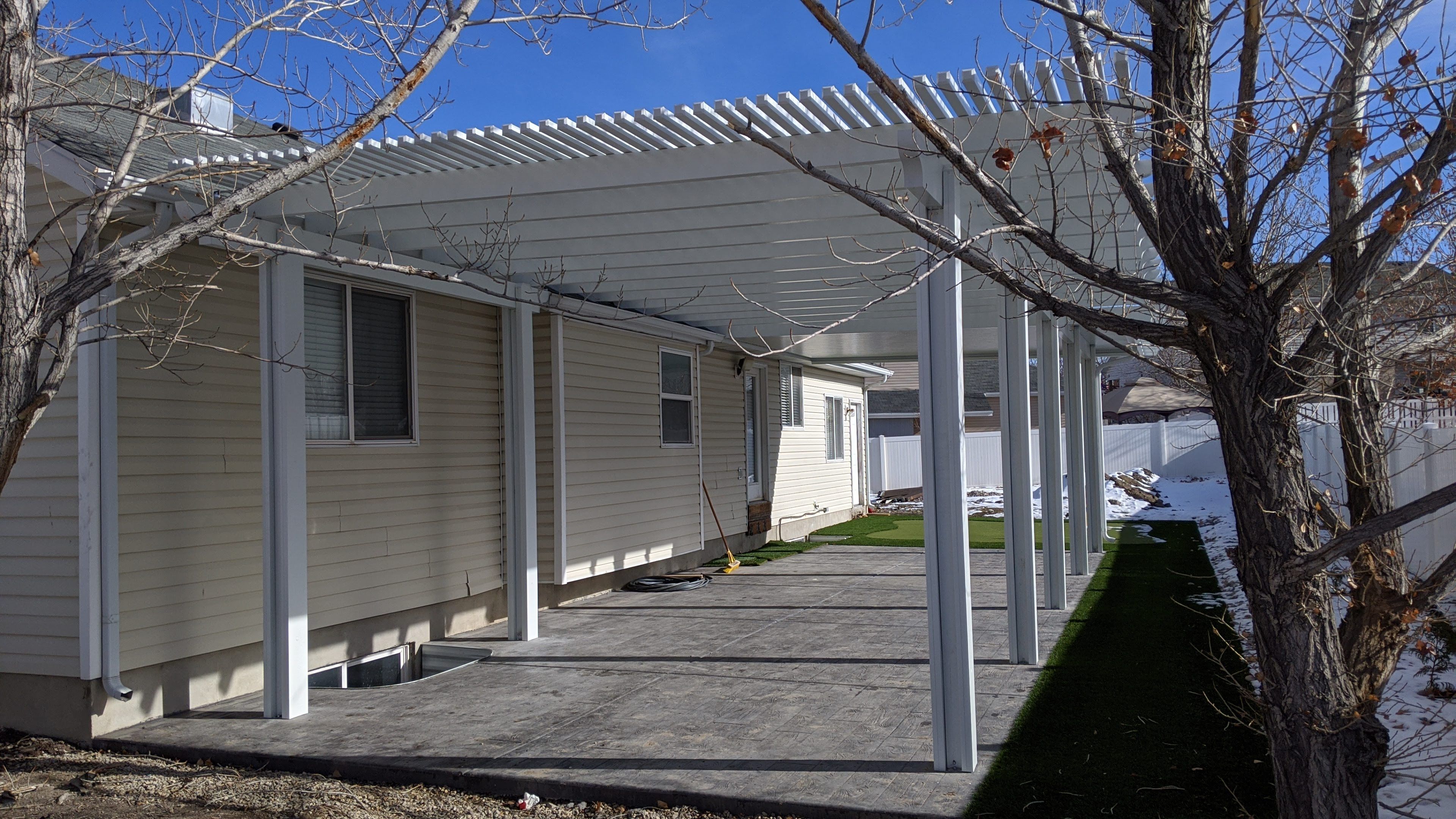 Combination patio cover and awning project by Utah Awnings