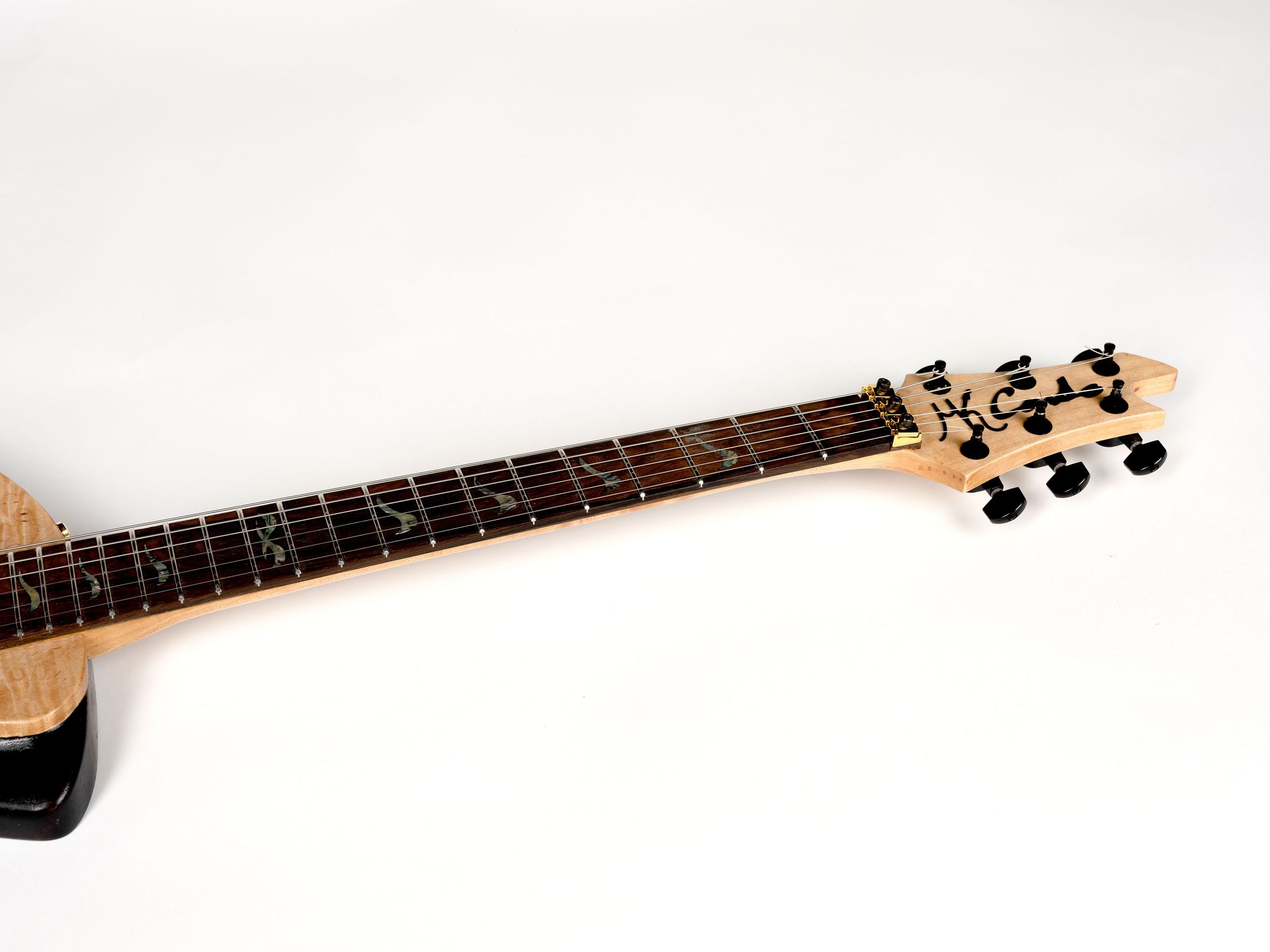 Maple/black guitar