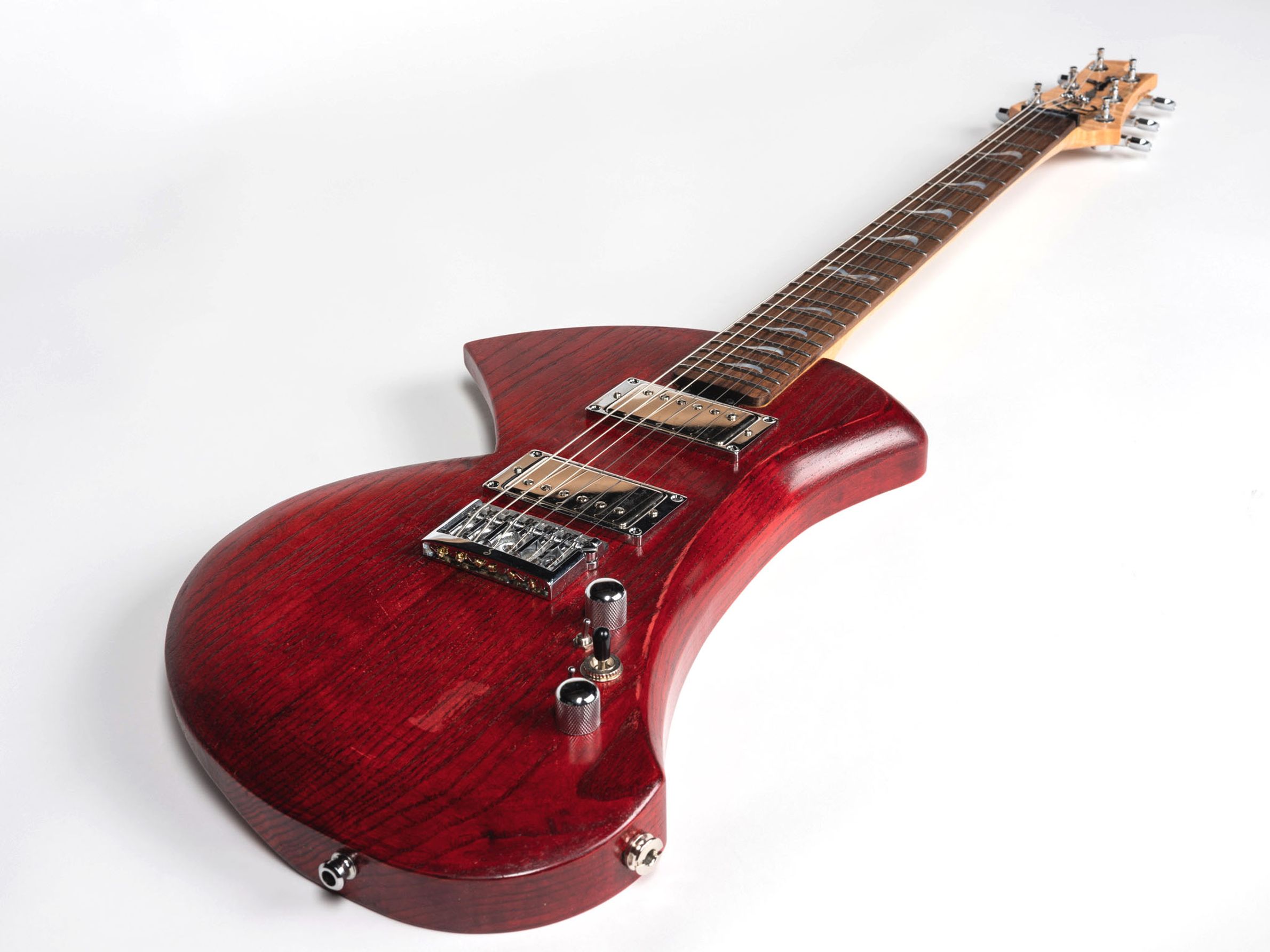 Red guitar with maple neck