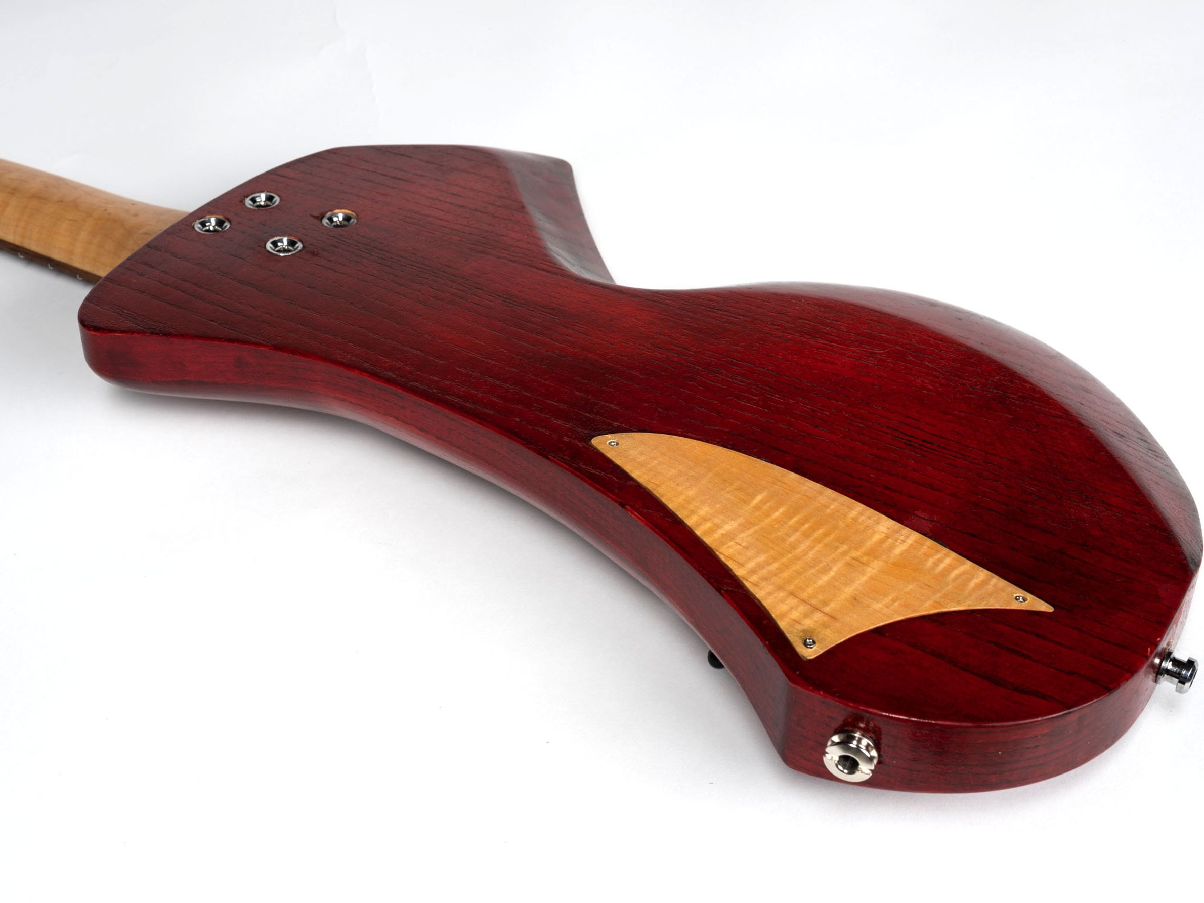 Red guitar with maple neck