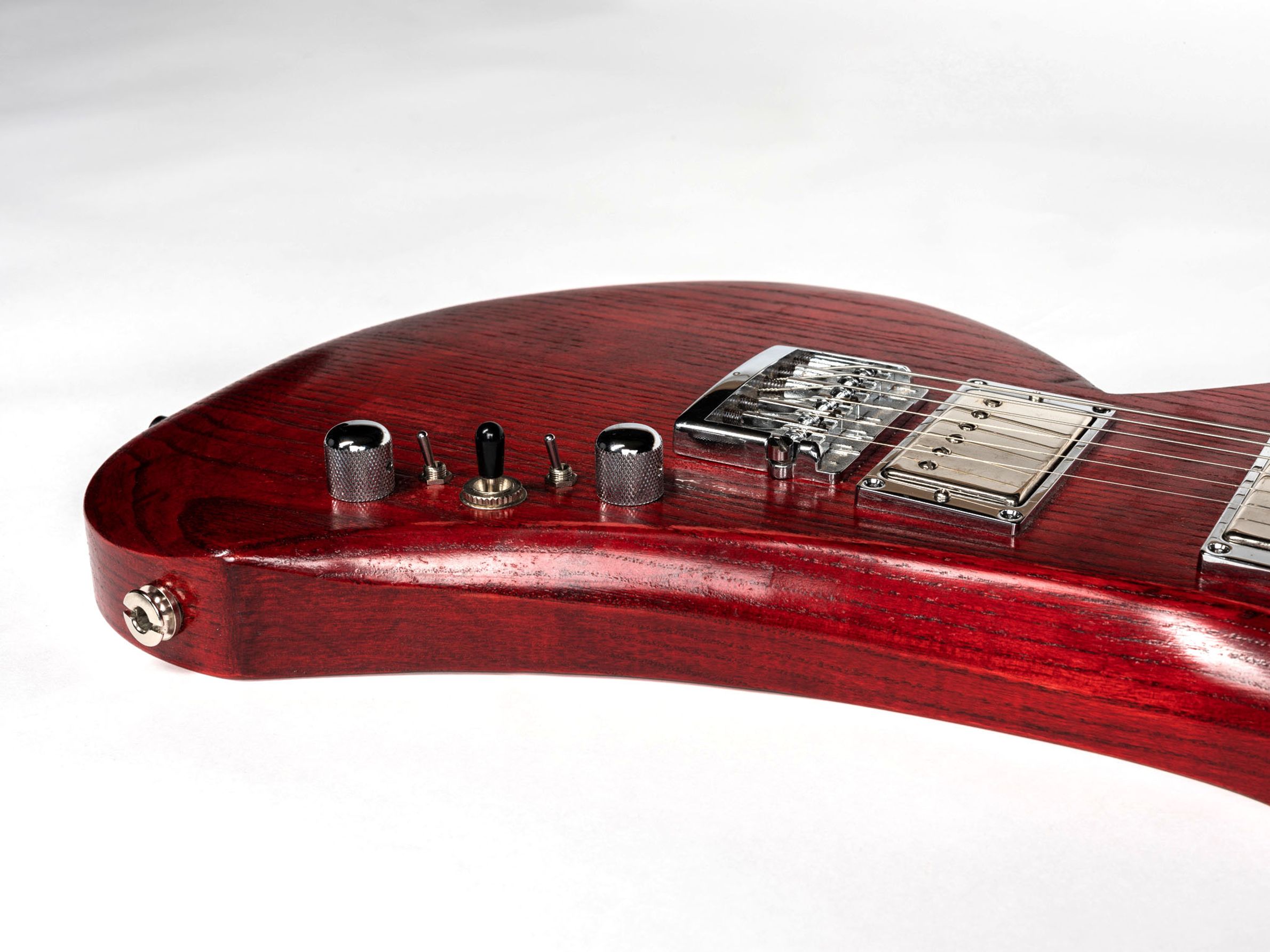 Red guitar with maple neck