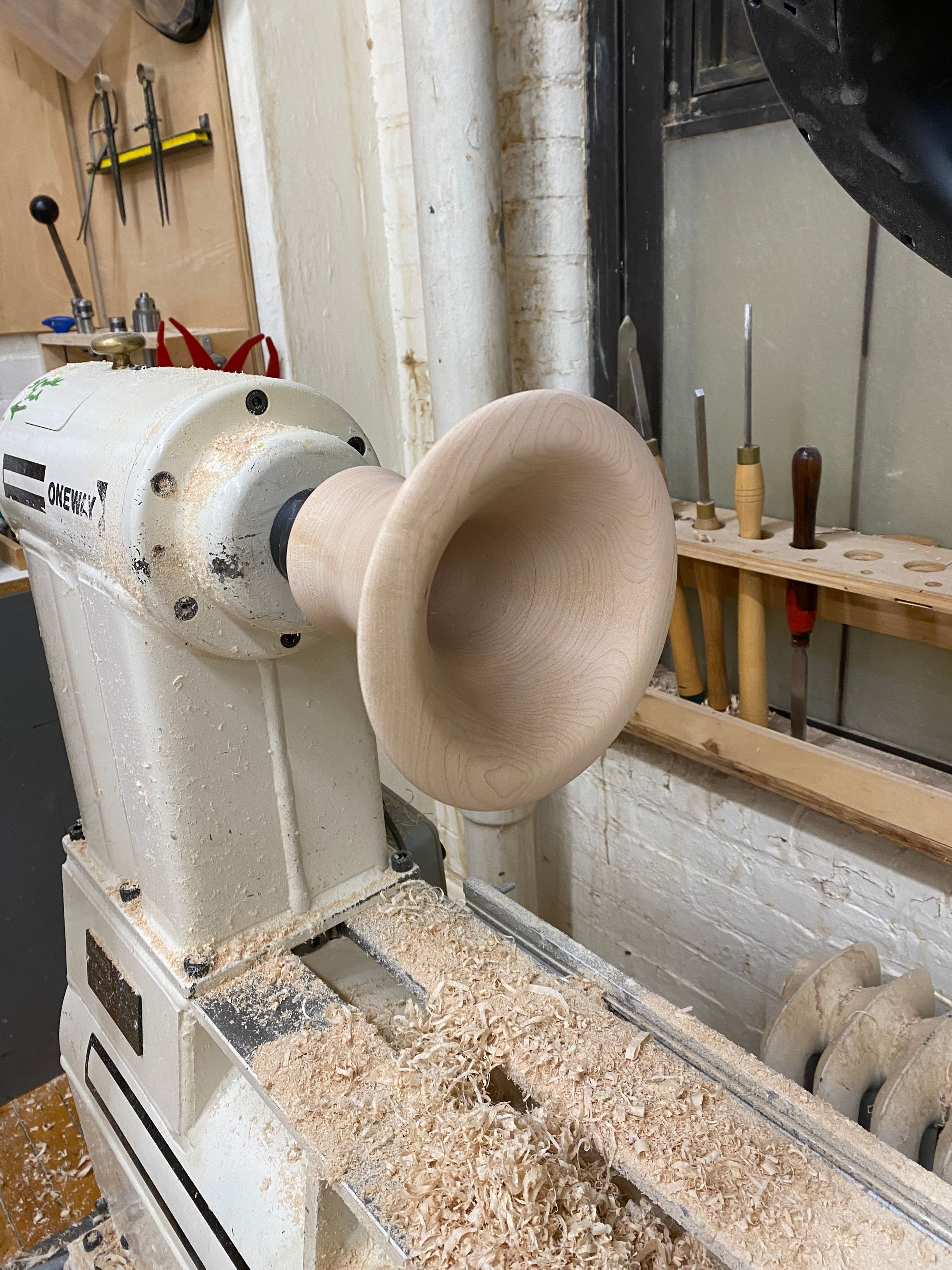 Maple horn on lathe