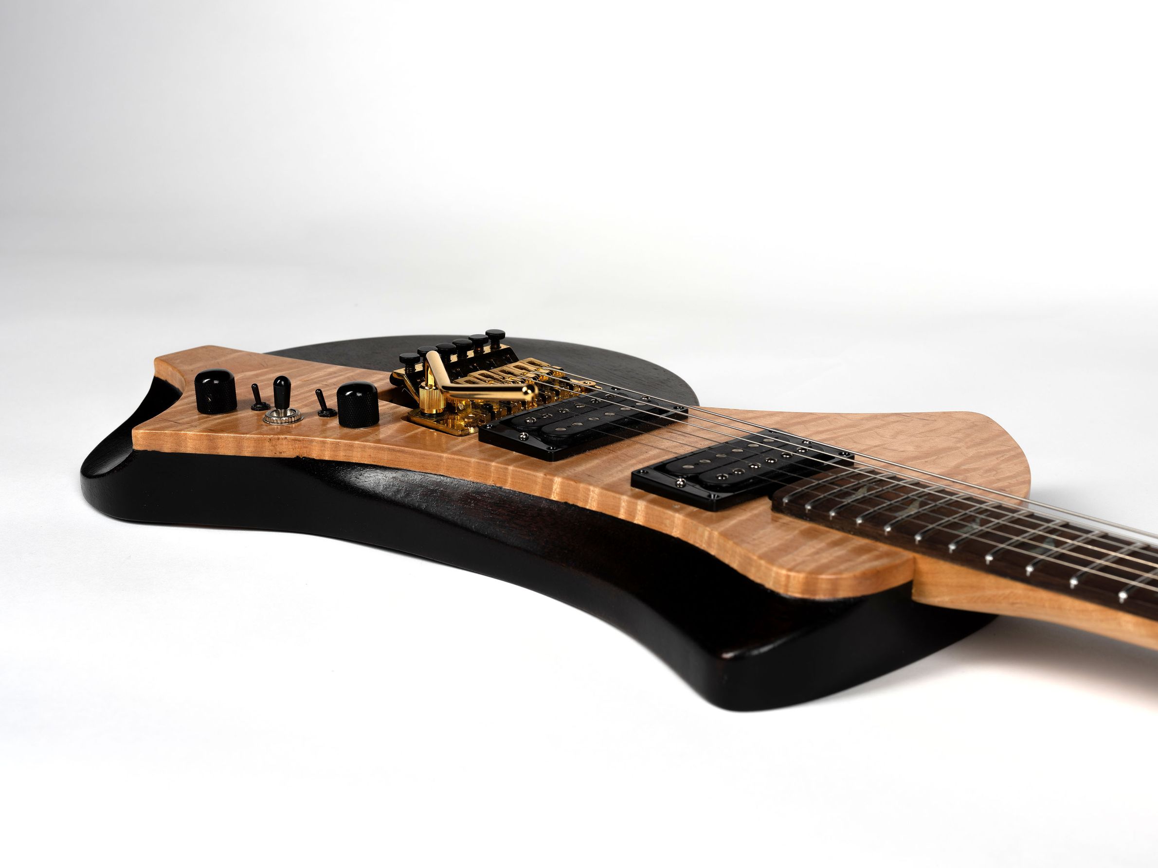 Maple/black guitar