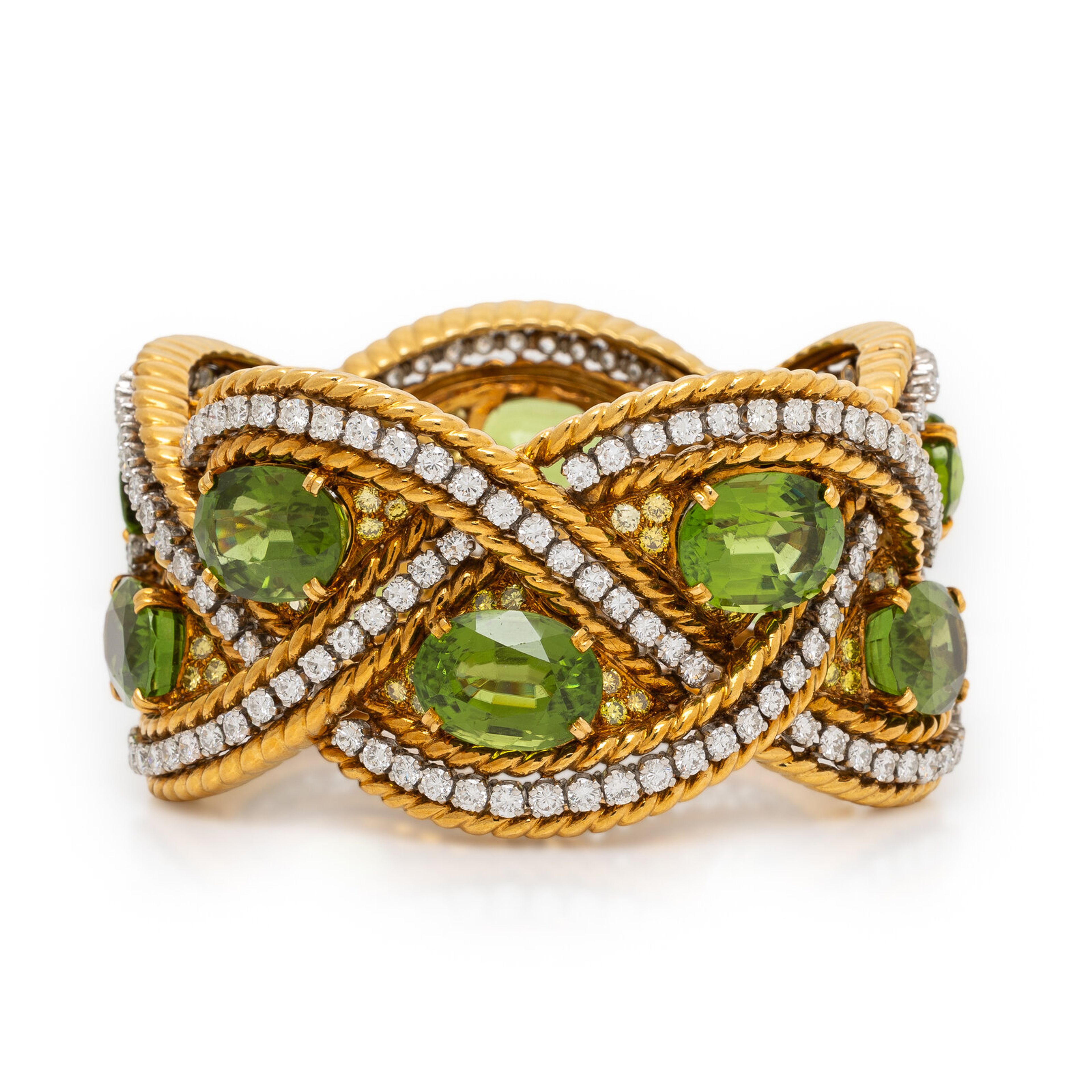 Verdura, Gold, Peridot, Diamond and Colored Diamond Bracelet
Estimate: $30,000 – 50,000