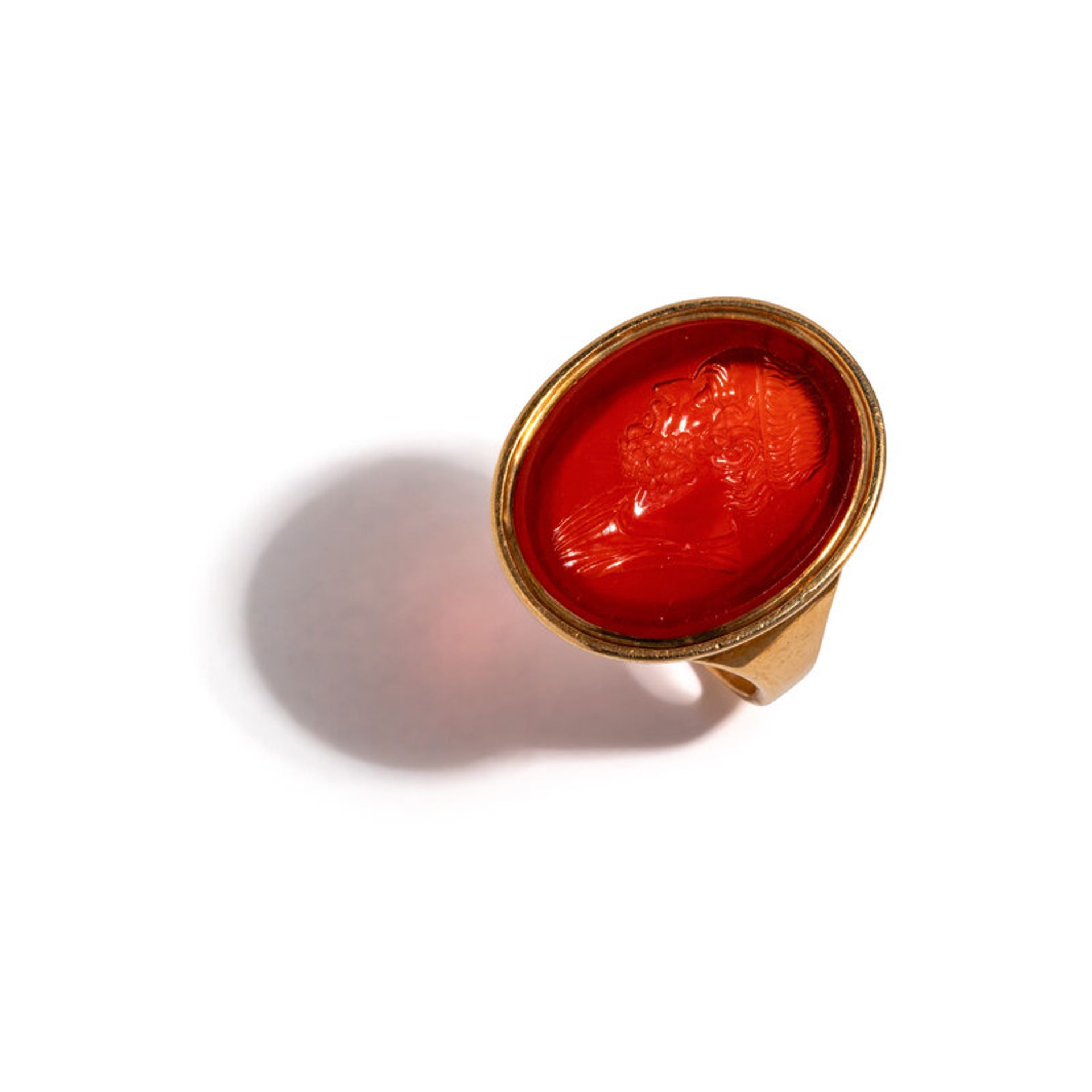 Lot 226 | A Neoclassical Gold and Carnelian Finger Ring with a Portrait Bust of Homer | Estimate: $2,000 - 3,000