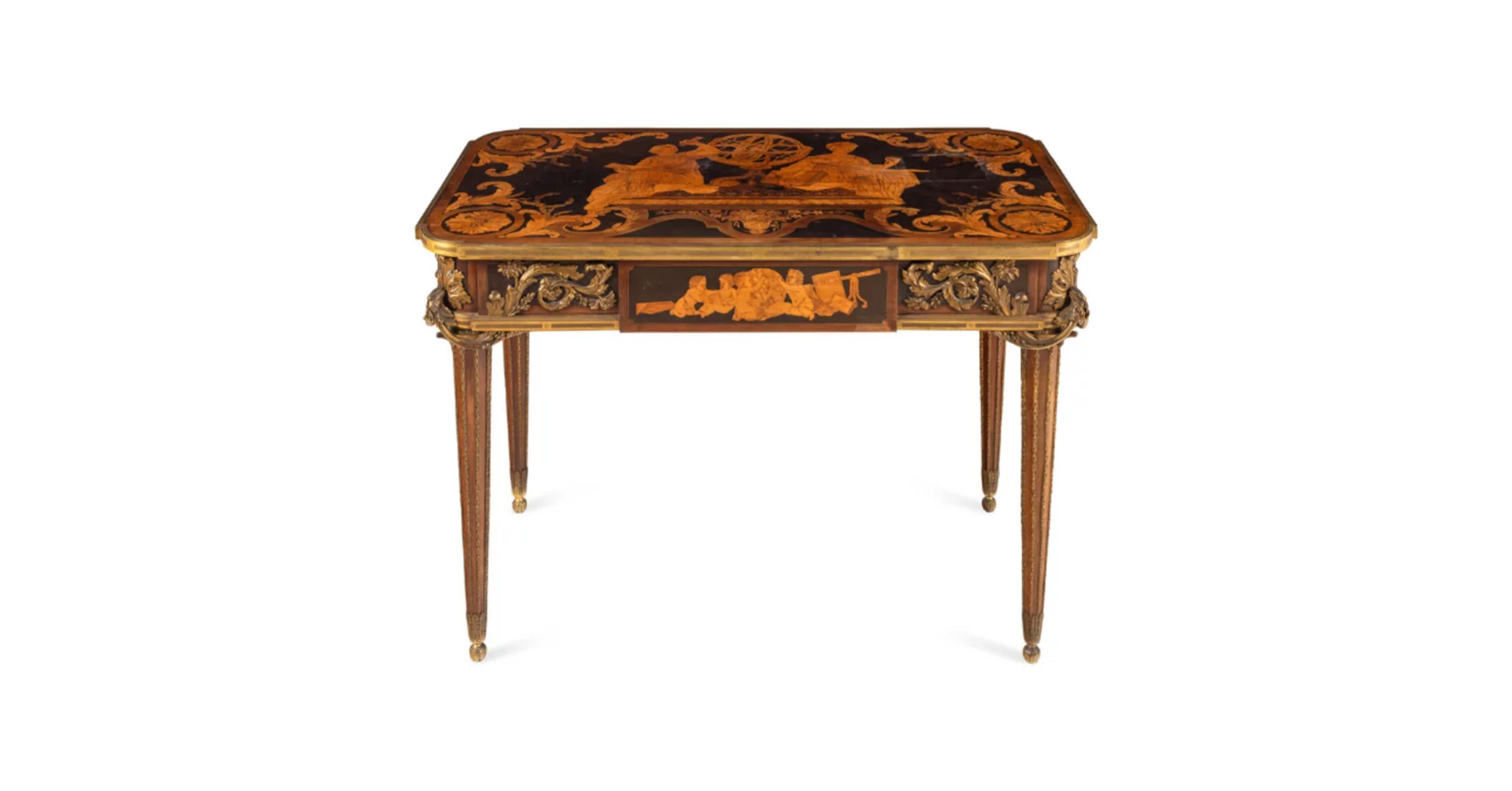 A Louis XVI Style Marquetry and Gilt Bronze Mounted Occasional Table