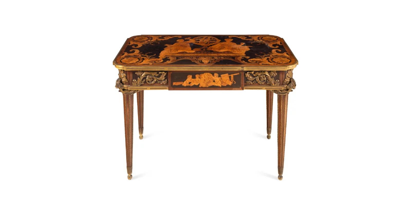 A Louis XVI Style Marquetry and Gilt Bronze Mounted Occasional Table