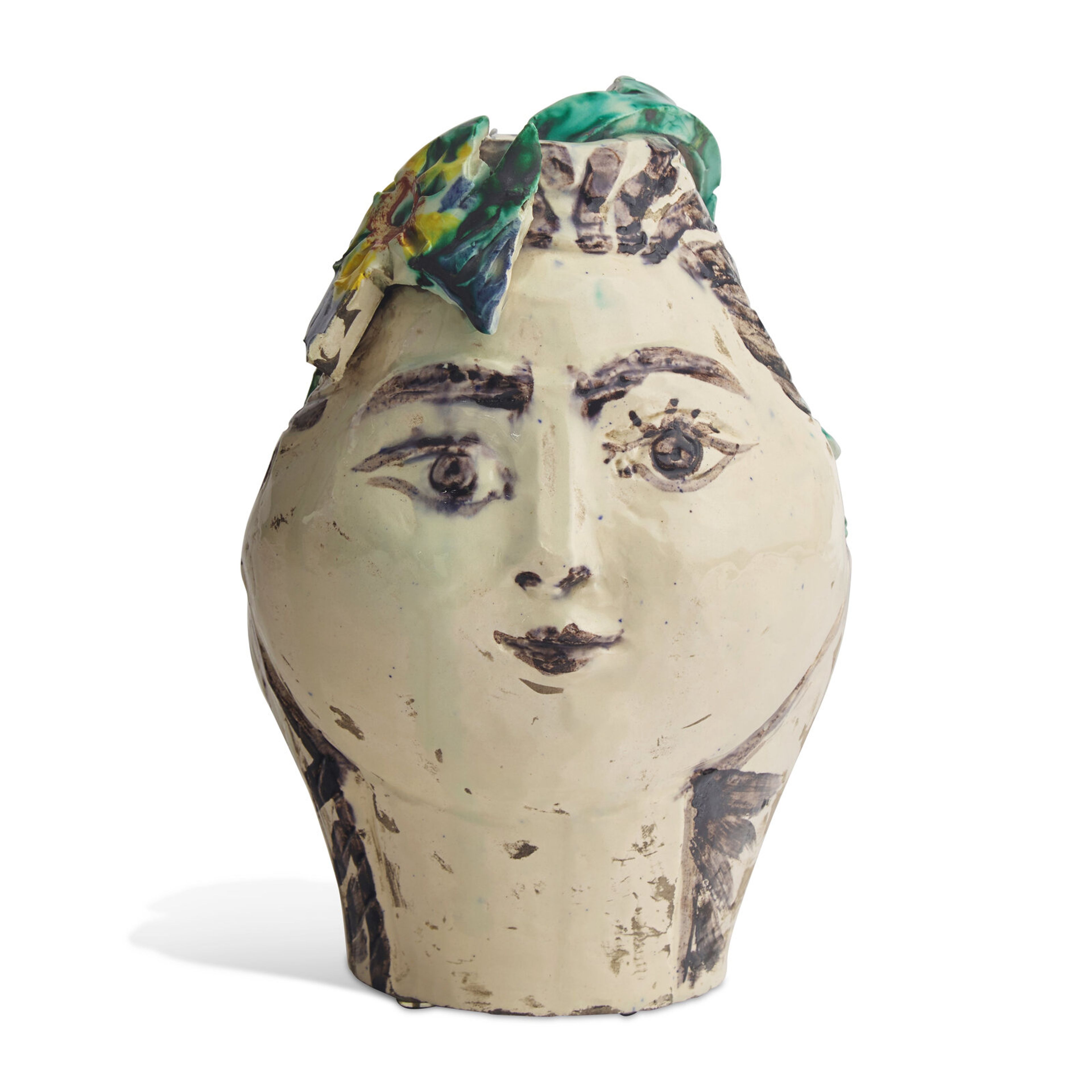 Lot 32 | Pablo Picasso (Spanish, 1881-1973)  Tête de Femme Couronnée de Fleurs (Pichet), Unique Ceramic, 1954  $200,000 – 300,000 