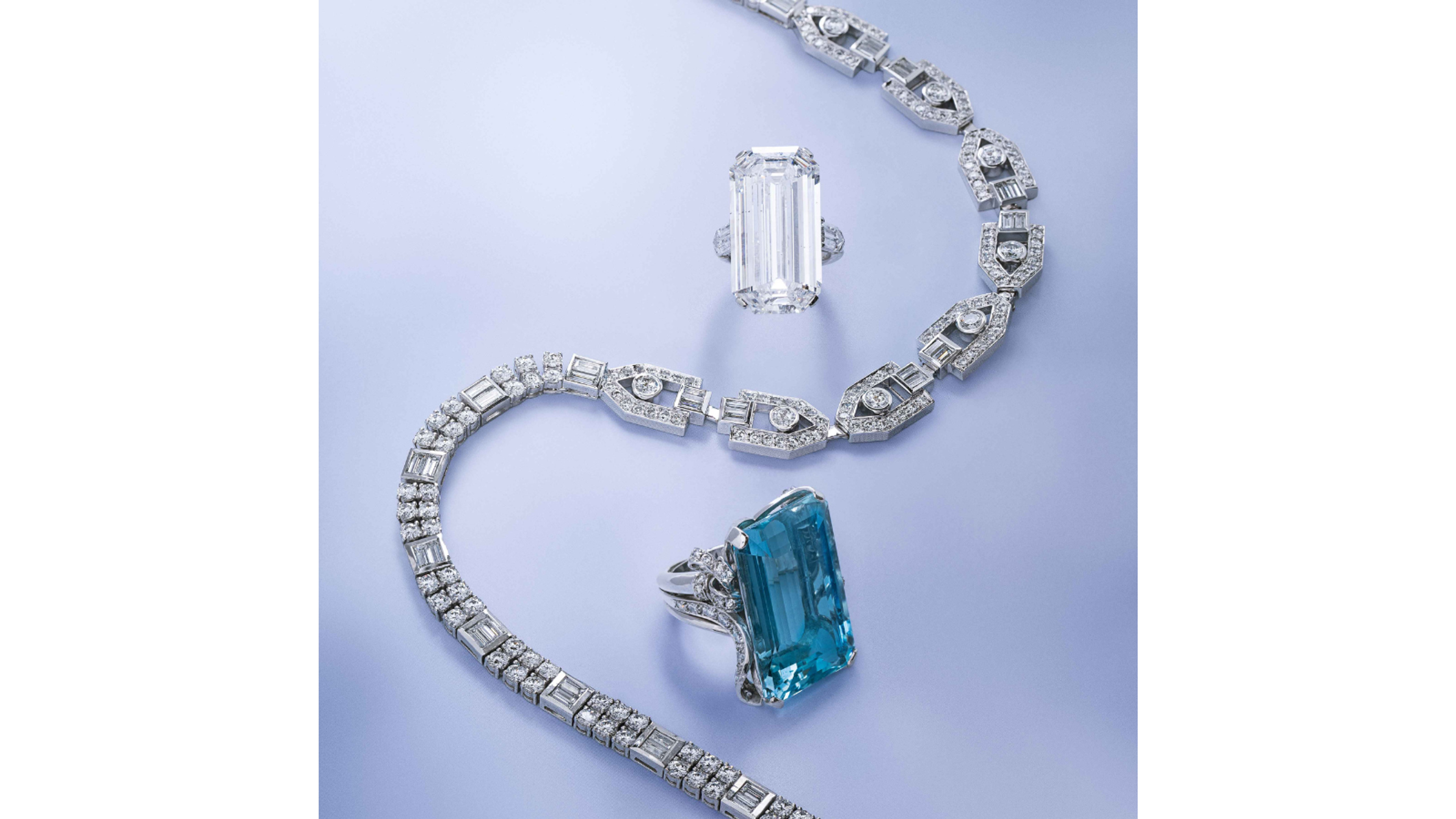 From Left to Right: Lot 97 | Diamond and White Gold Necklace | Estimate: $15,000 - $20,000; 
Lot 95 | Important Diamond Ring | Estimate: $350,000 - $450,000; 
Lot 137 | Nadja Buckley, Retro, Aquamarine, Diamond, and White Gold Ring | Estimate: $8,000 - $10,000