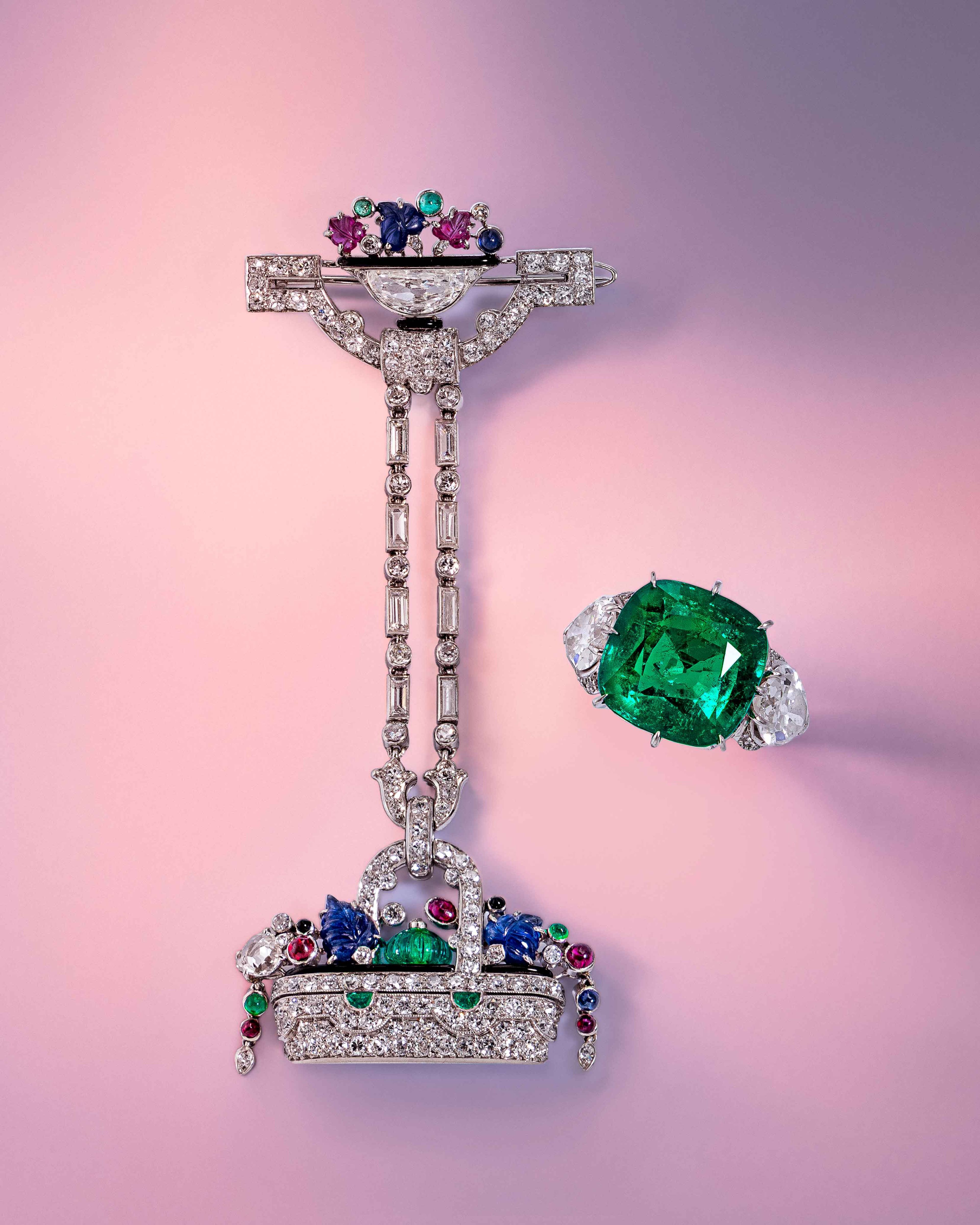 Lot 20 | Lacloche Frères, Art Deco, Diamond, Ruby, Emerald, and Sapphire Lapel Watch | Sold for $57,600  Lot 112 | Colombian Emerald, Diamond, and Platinum Ring | Sold for $128,000