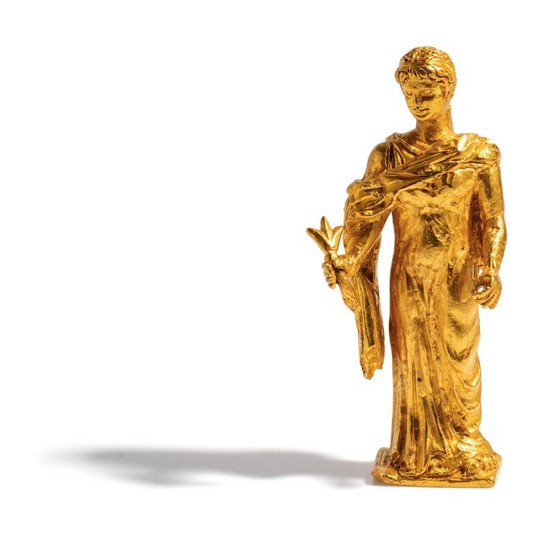 Lot 253 | A Neoclassical Gold Figure of the Goddess Flora | Estimate: $2,000 - 3,000